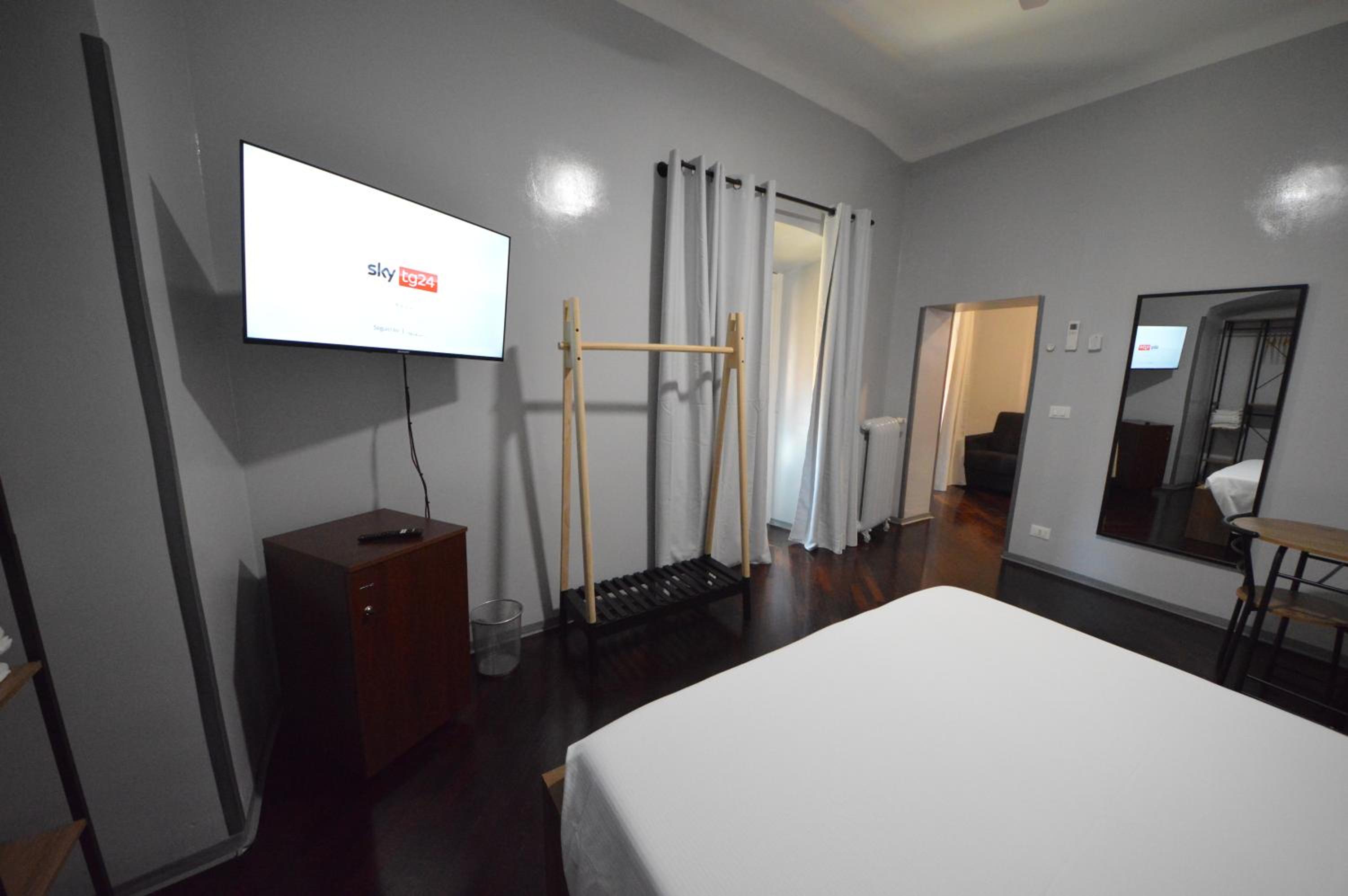Quadruple Room with Private Bathroom