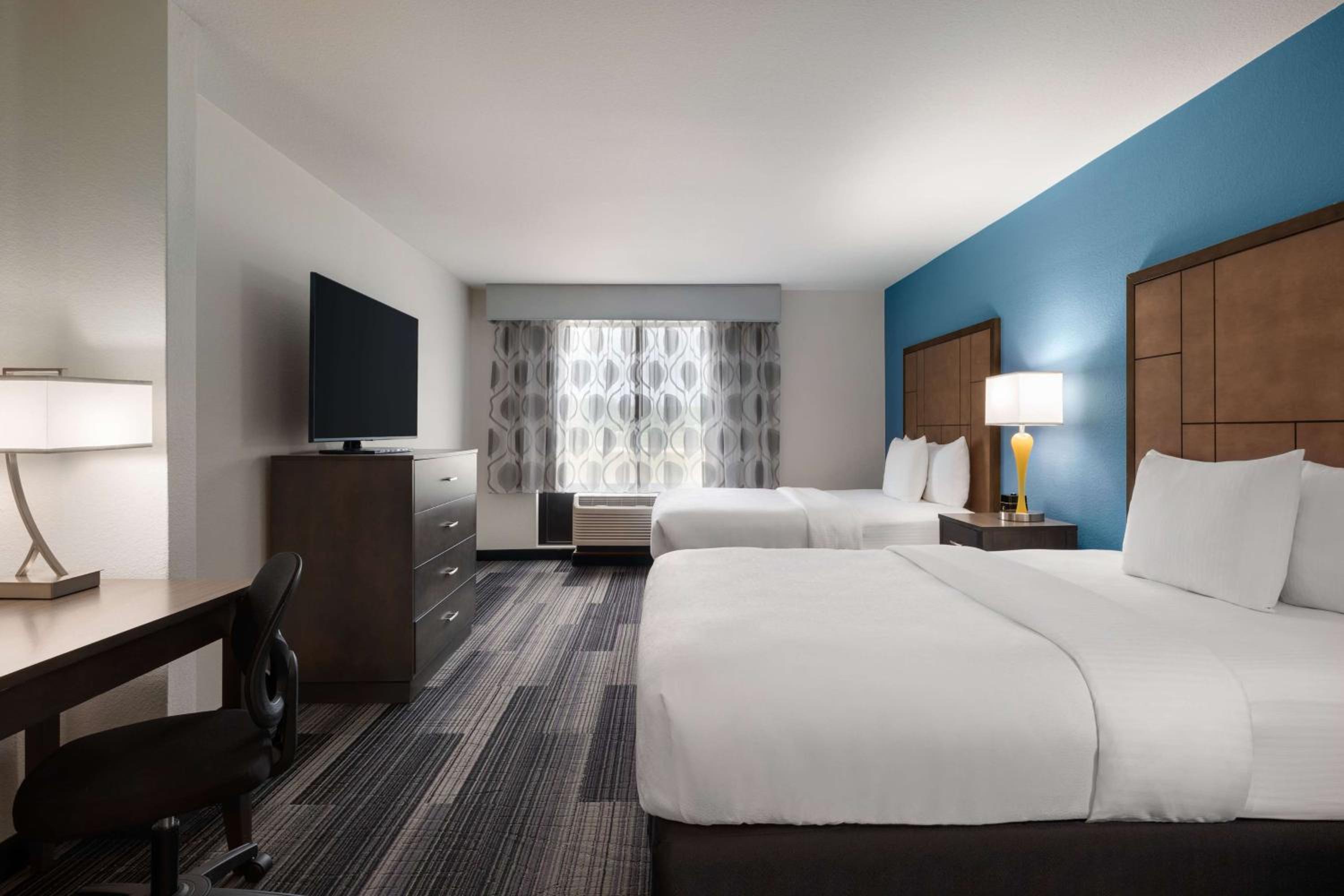 Deluxe Queen Room with Two Queen Beds - Photo 1