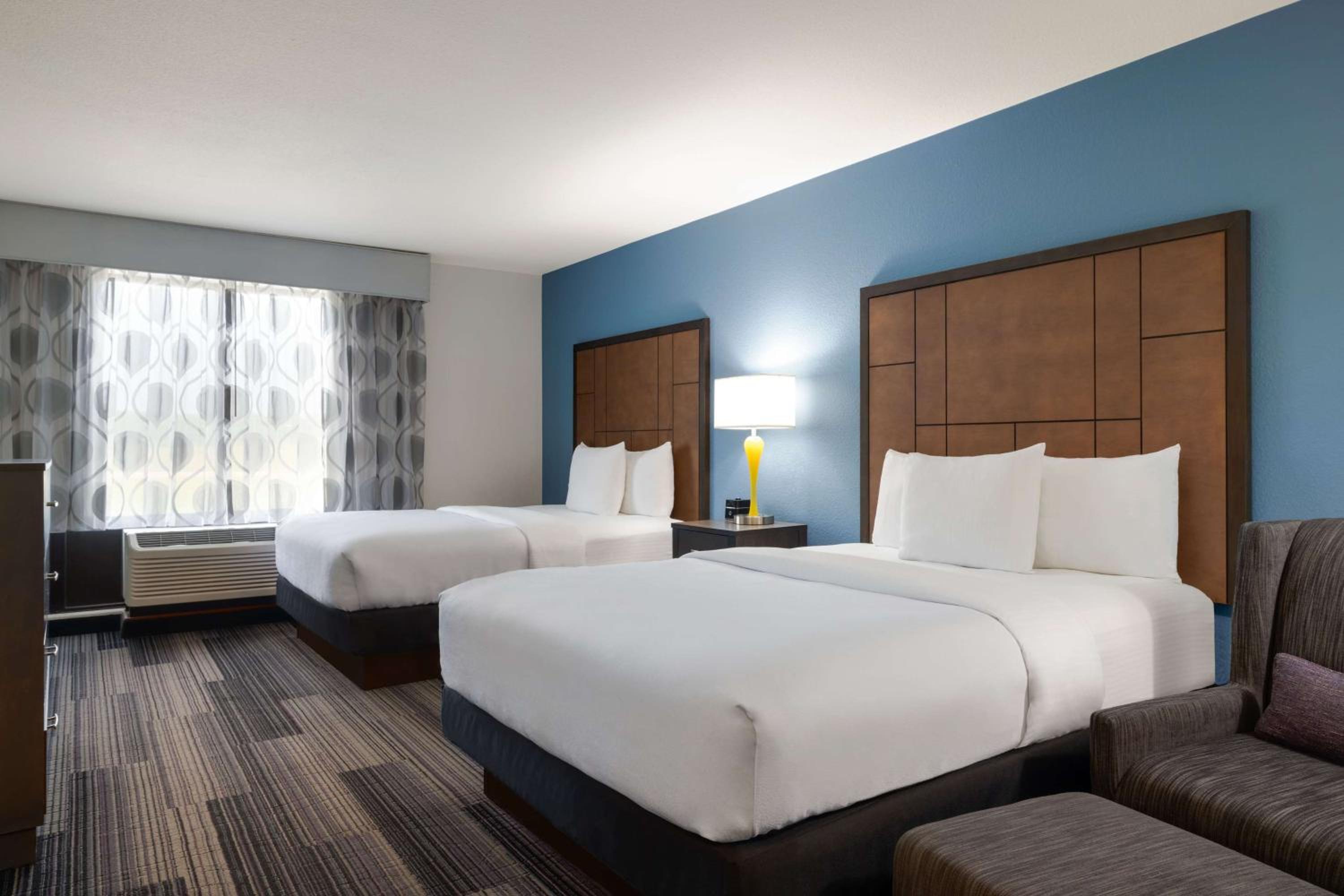 Queen Room with Two Queen Beds and Mobility/Hearing Access - Non-Smoking - Photo 1