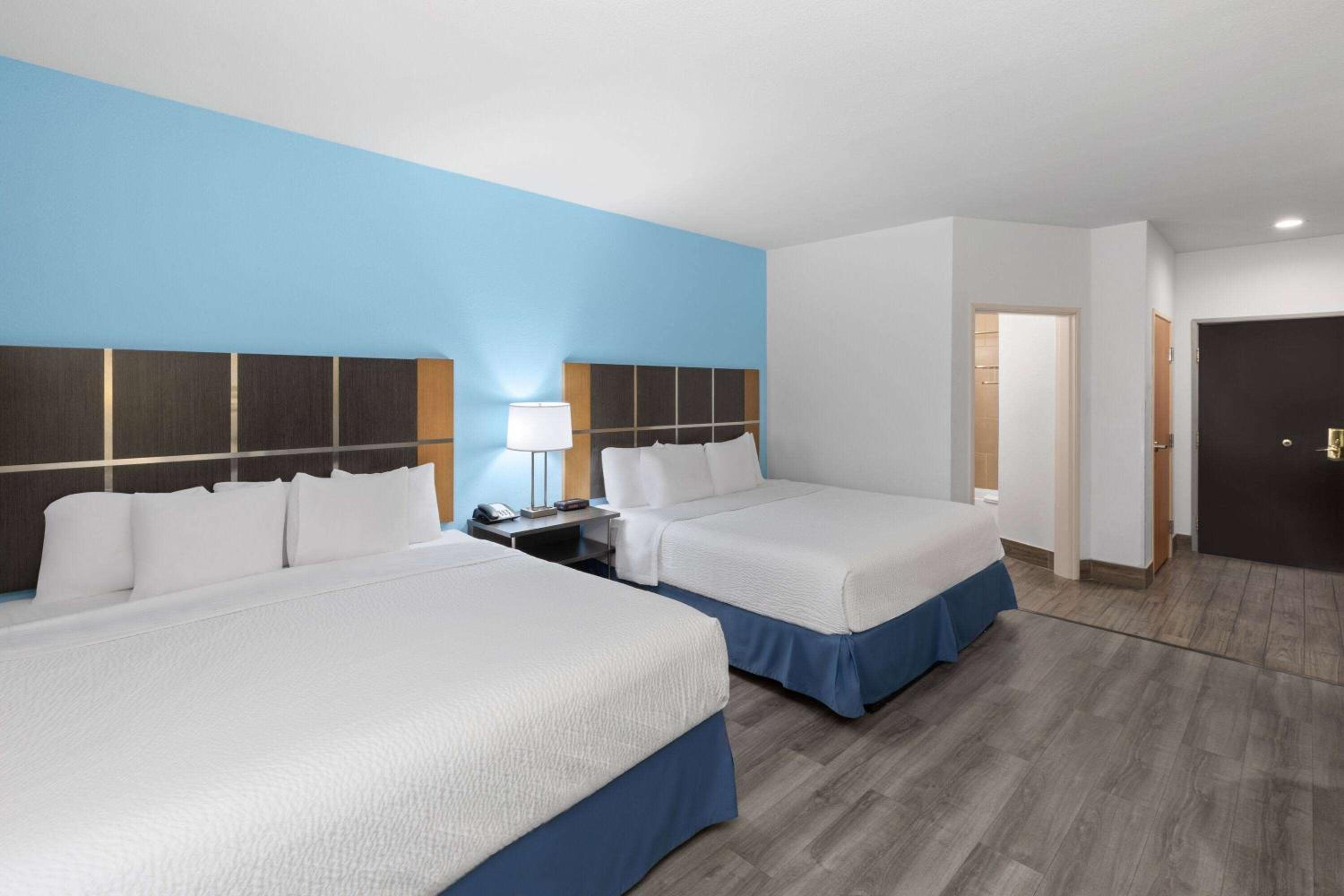 King Room with Two King Beds - Non-Smoking photo 1