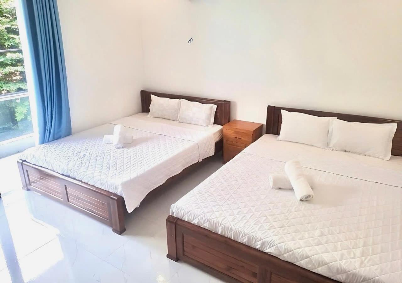 Deluxe Queen Room with Two Queen Beds photo 1