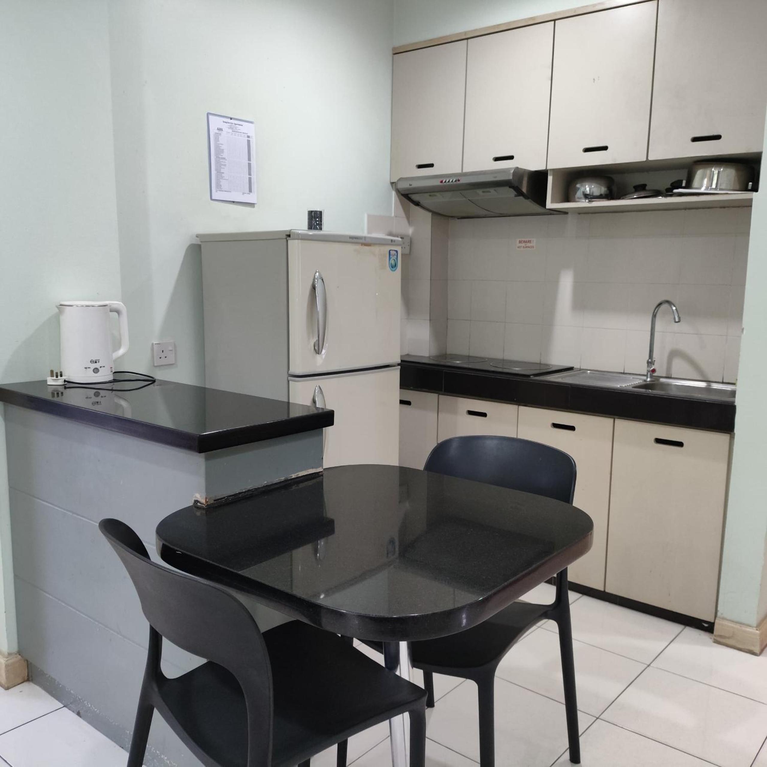 Three-Bedroom Apartment - Photo 6