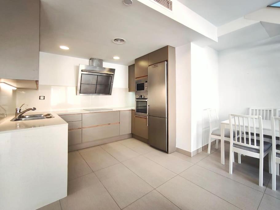 Three-Bedroom Apartment photo 2