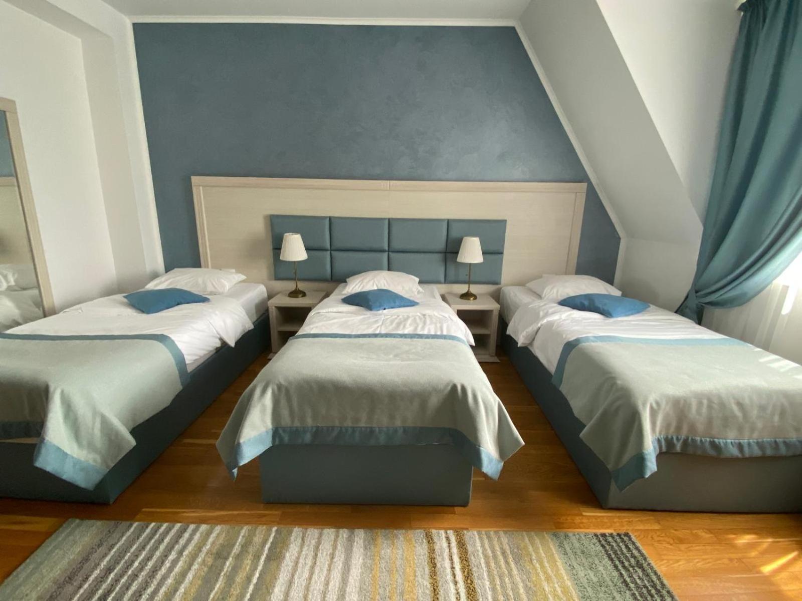 Triple Room - Photo 1