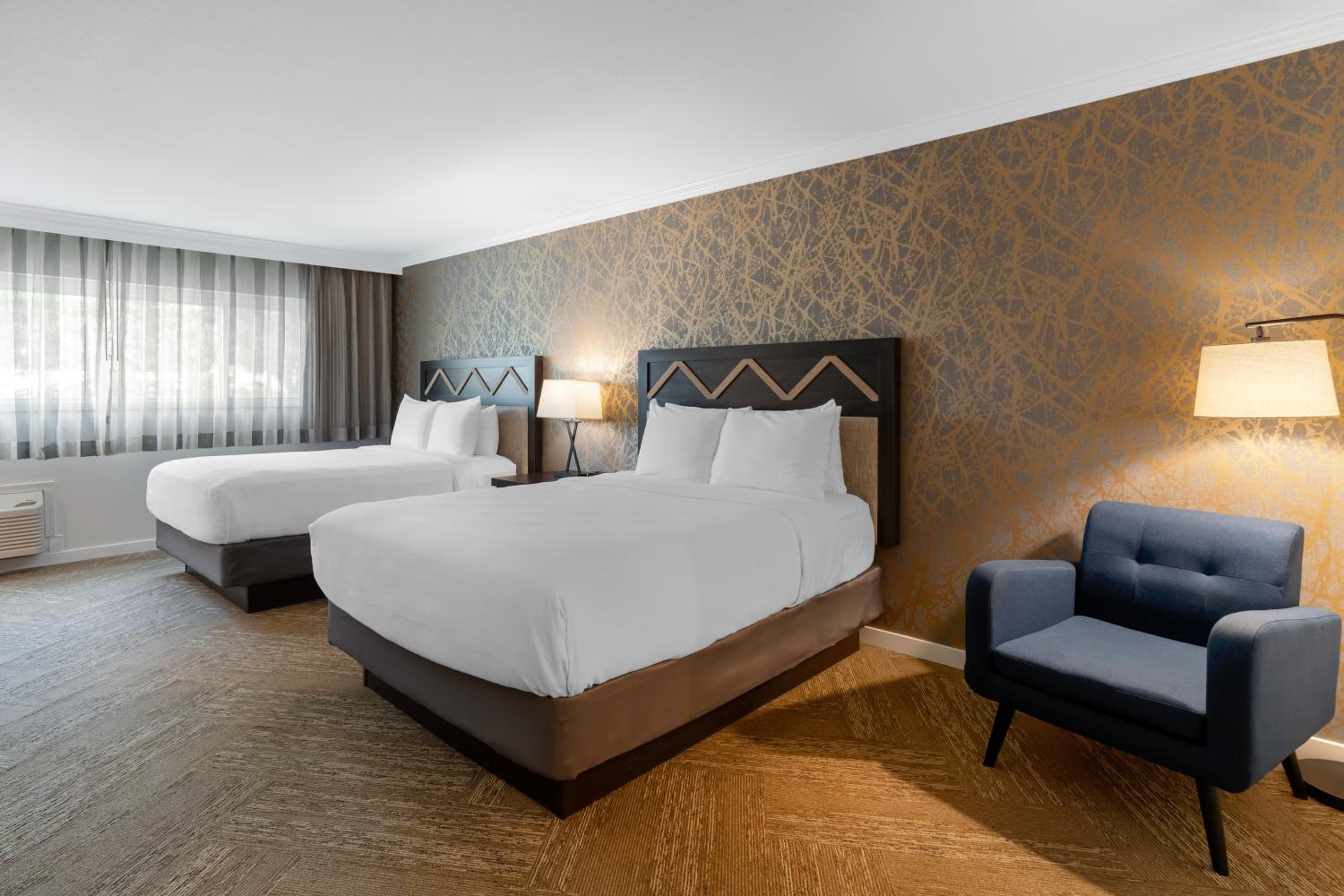 Queen Room with Two Queen Beds and Walk-In Shower - Interior Entrance/Non-Smoking photo 1