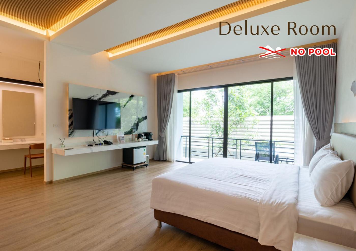Deluxe Room - Photo 2