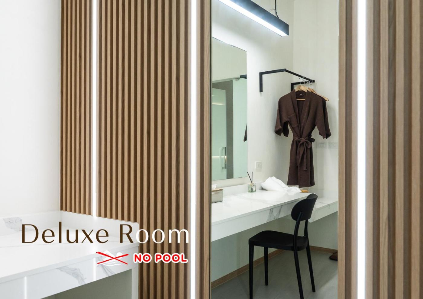 Deluxe Room - Photo 4