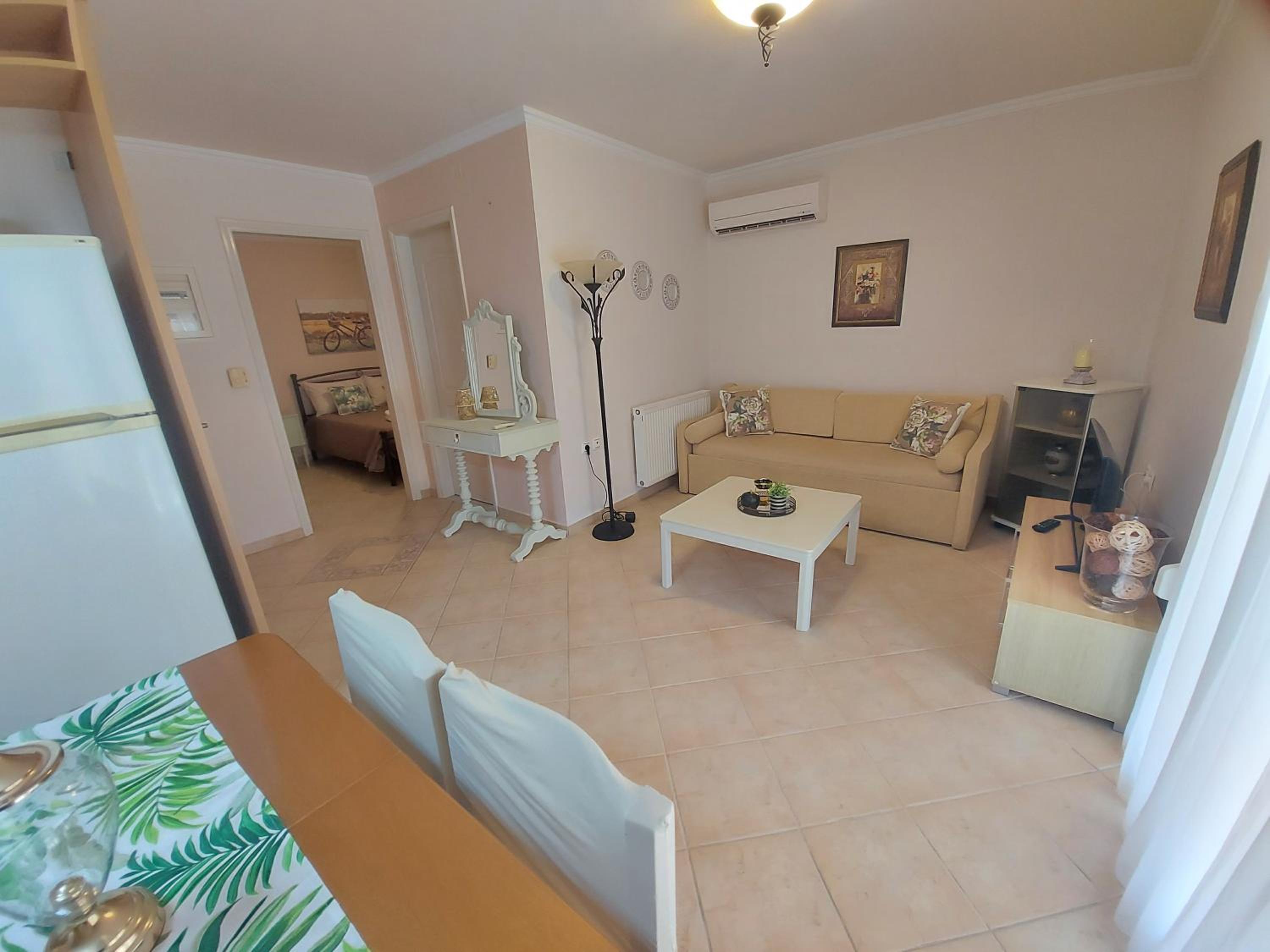One-Bedroom Apartment with Balcony and City View