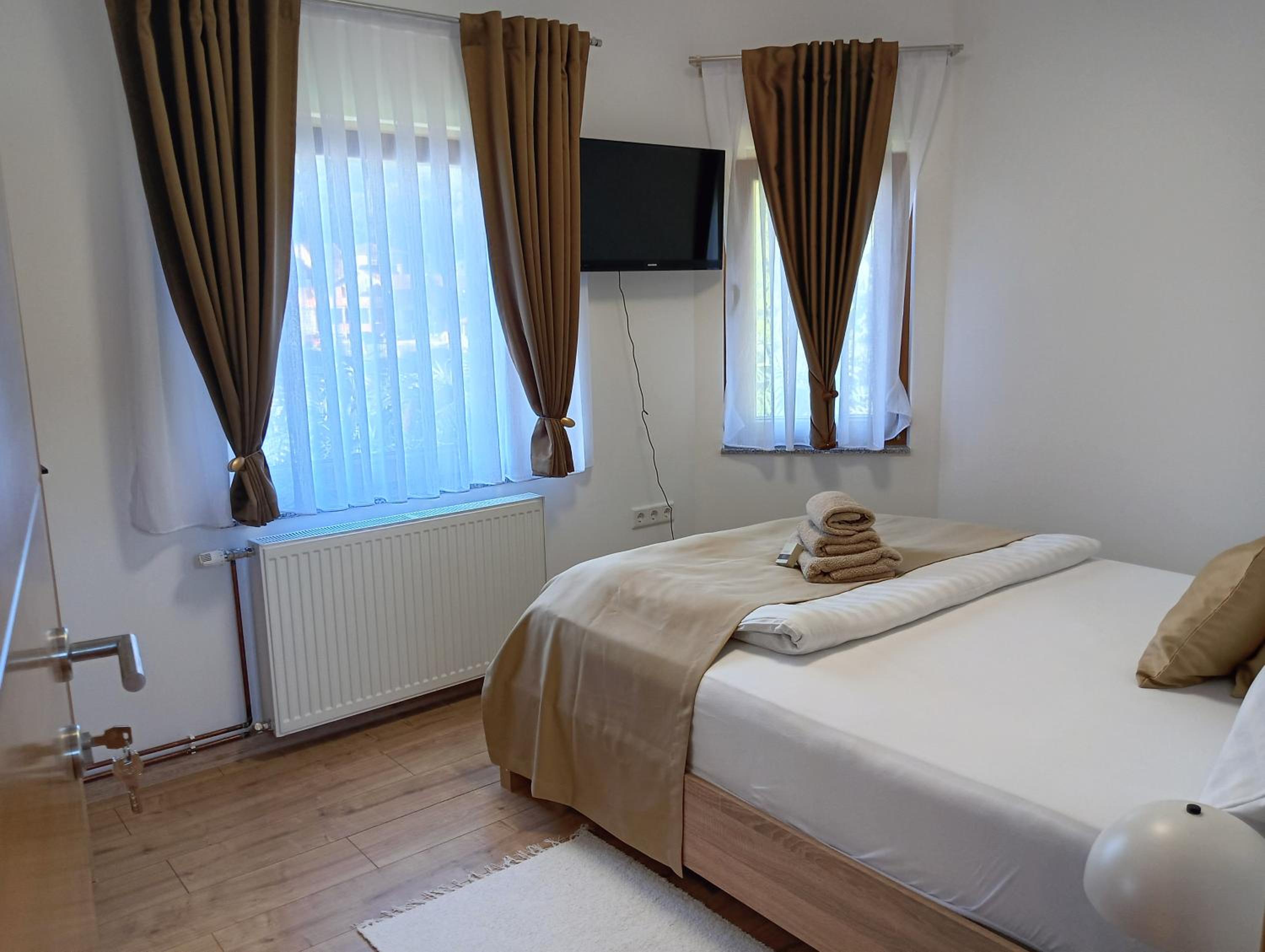 One-Bedroom Apartment with Balcony and Water View photo 1