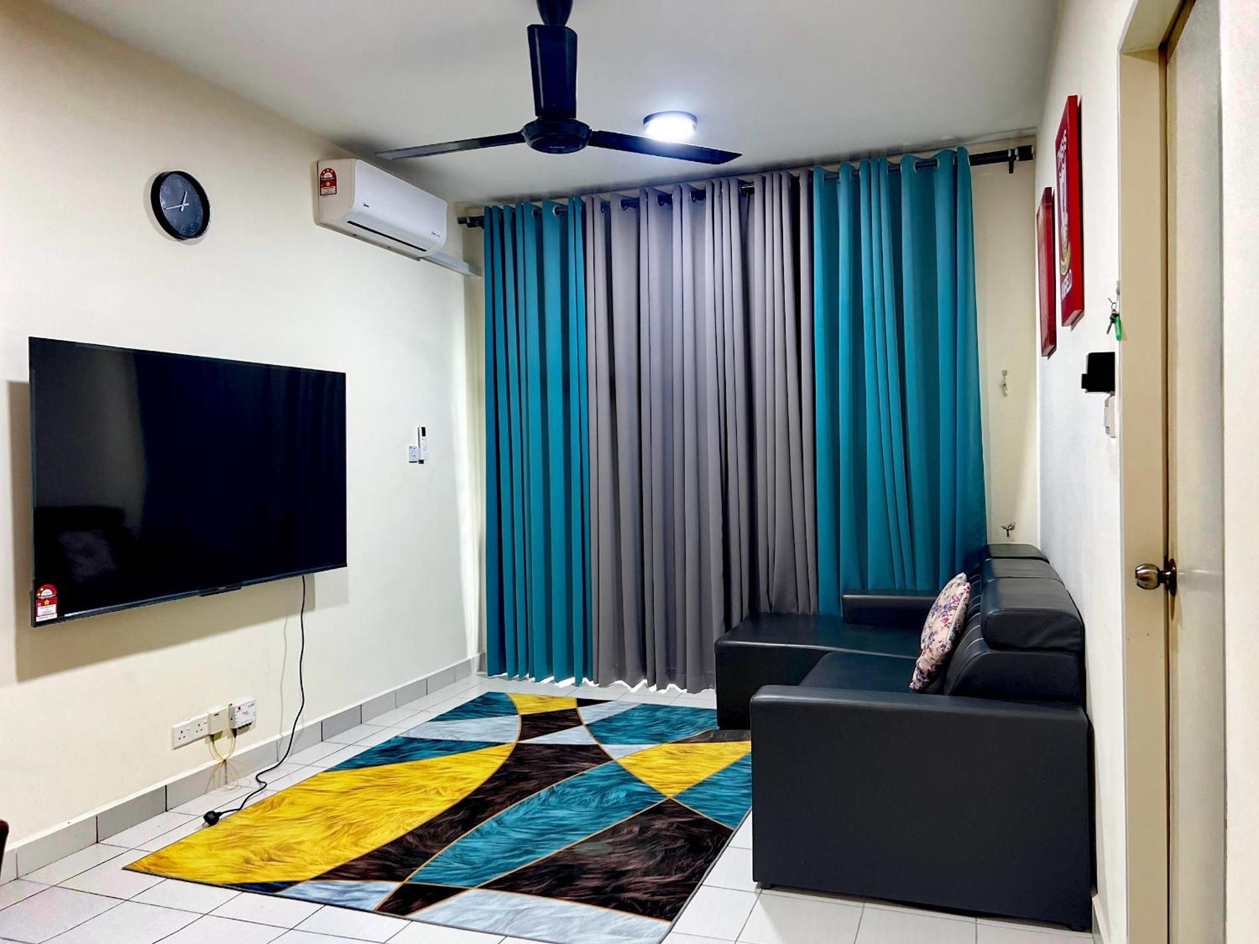 Three-Bedroom Apartment photo 1