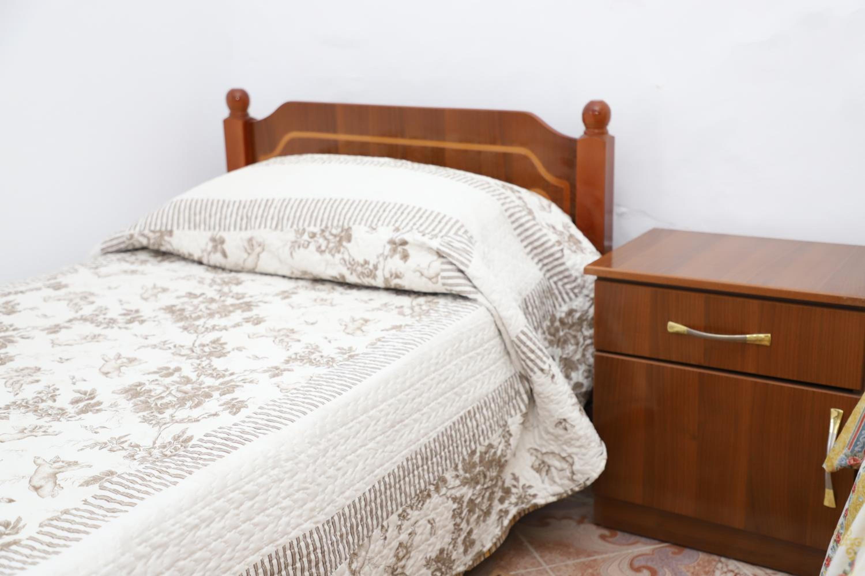 Quadruple Room with Private Bathroom