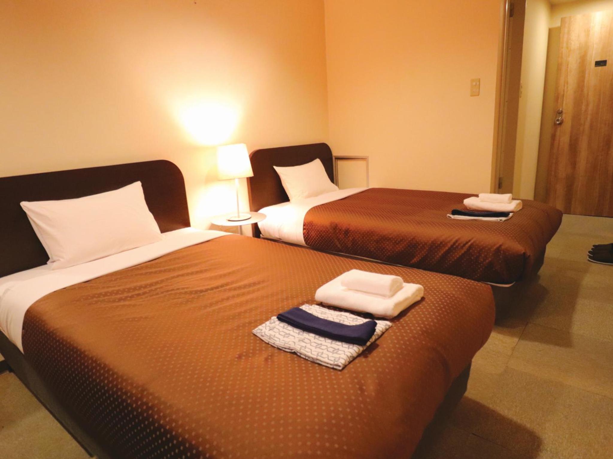 Twin Room - Photo 1