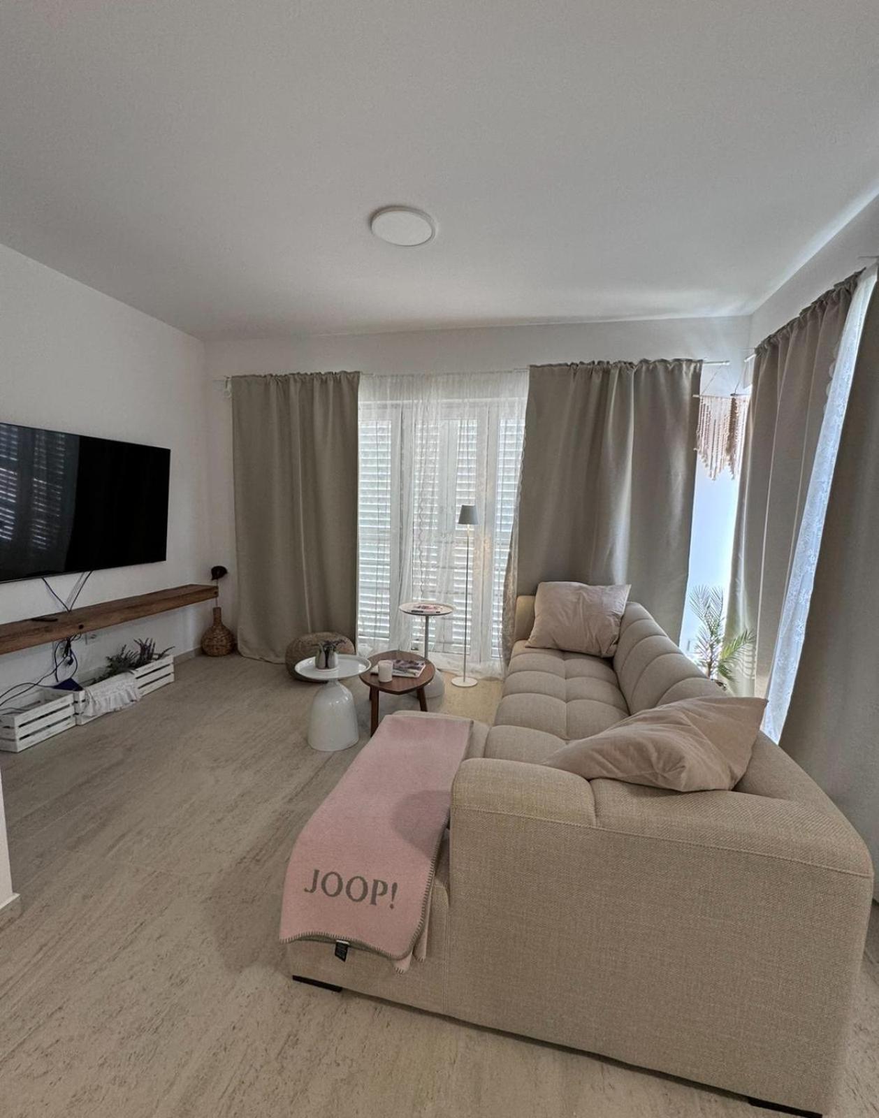 Three-Bedroom Apartment photo 1