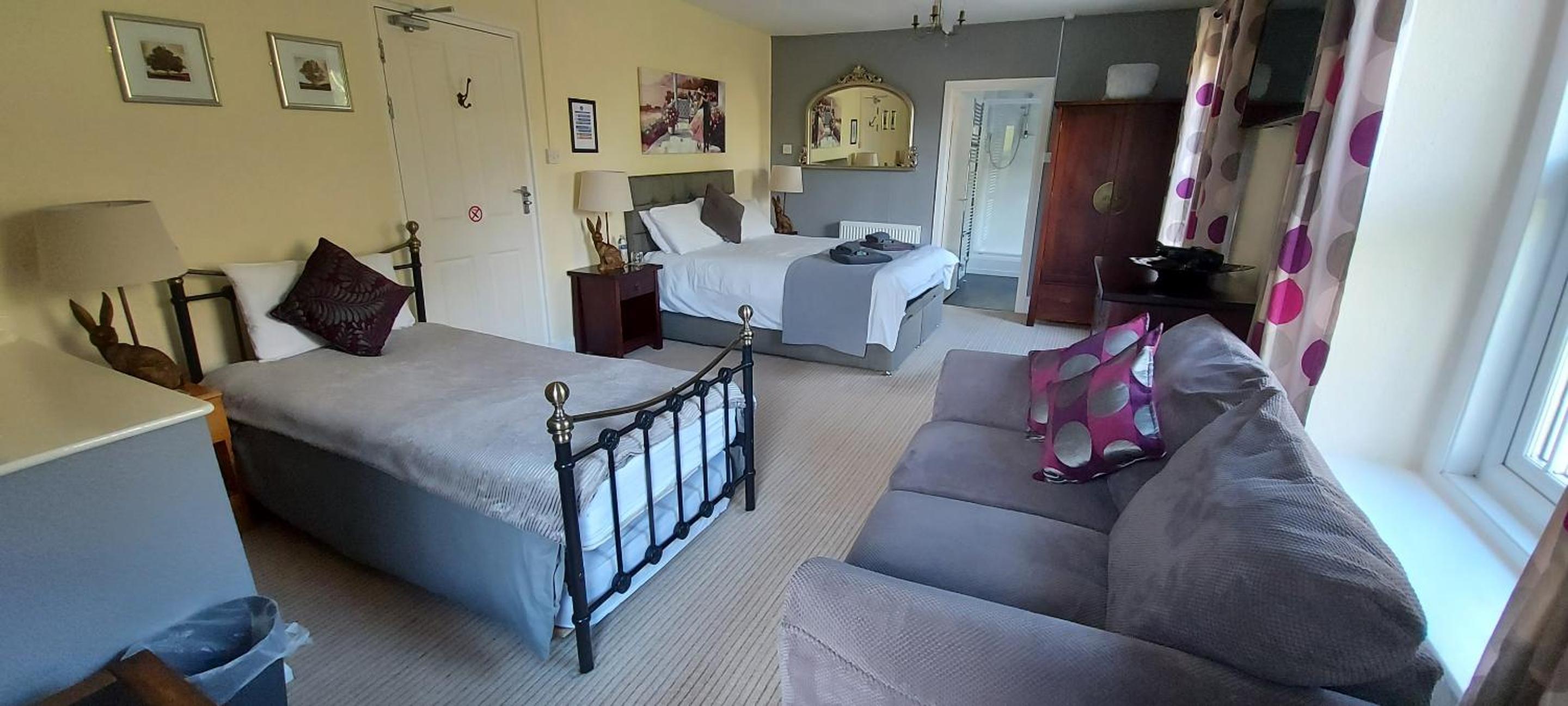 Deluxe Quadruple Room - Photo 1