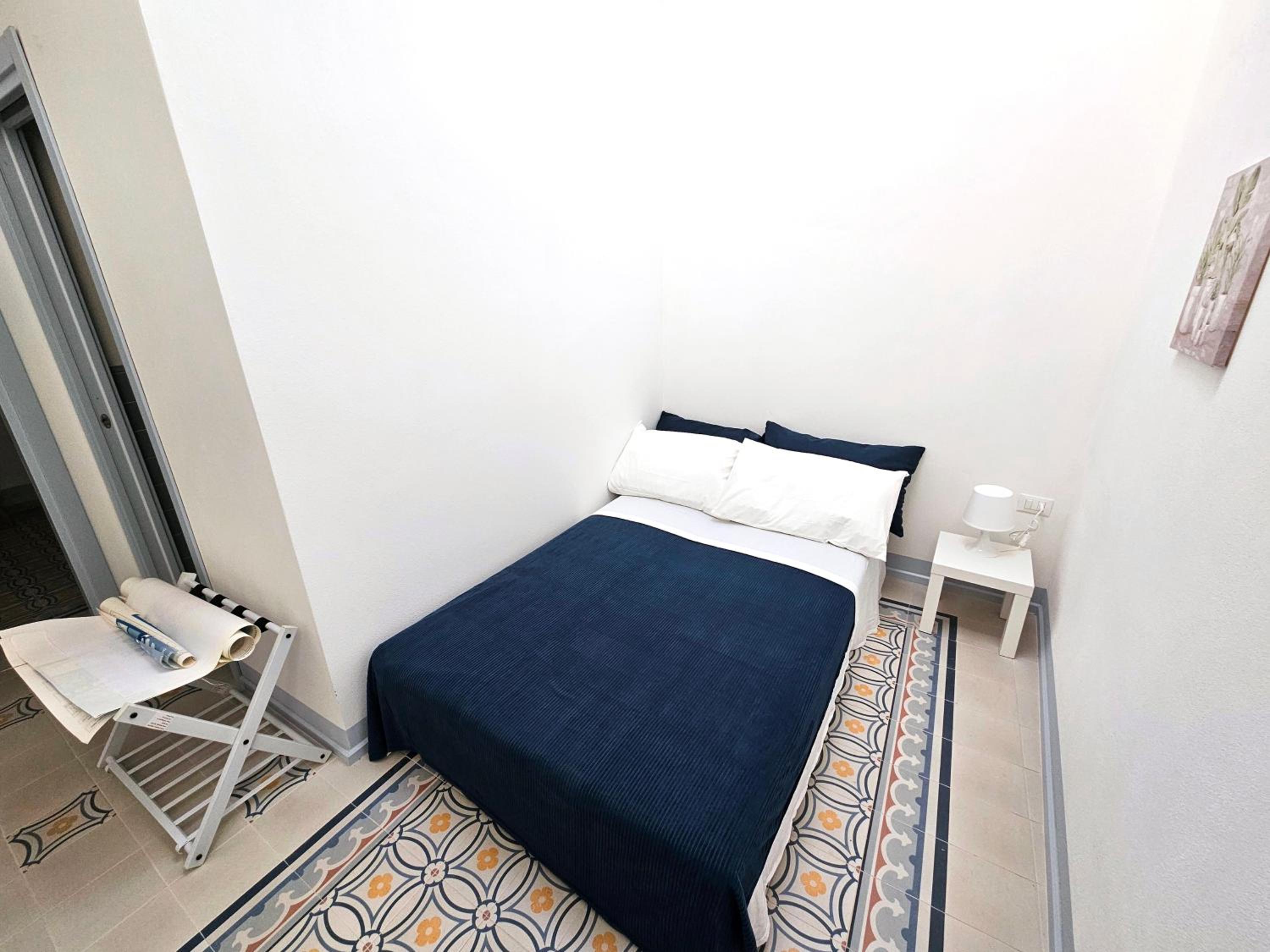 Quadruple Room with Private Bathroom