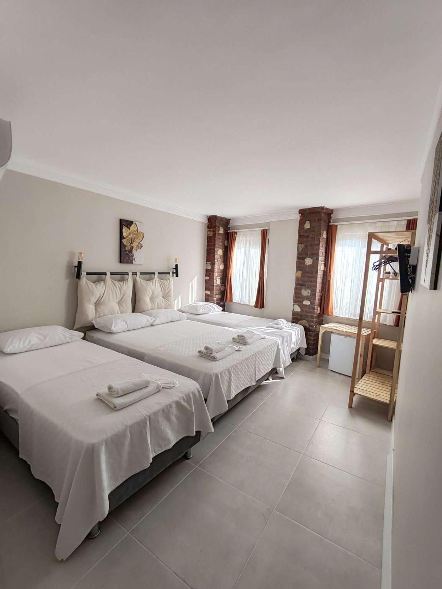 Quadruple Room - Photo 1