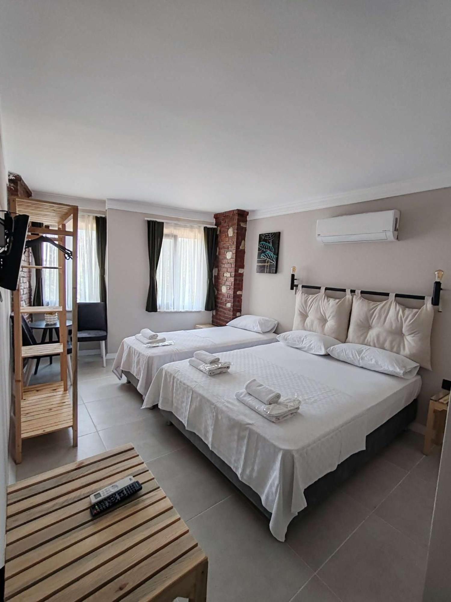 Deluxe Triple Room - Photo 2