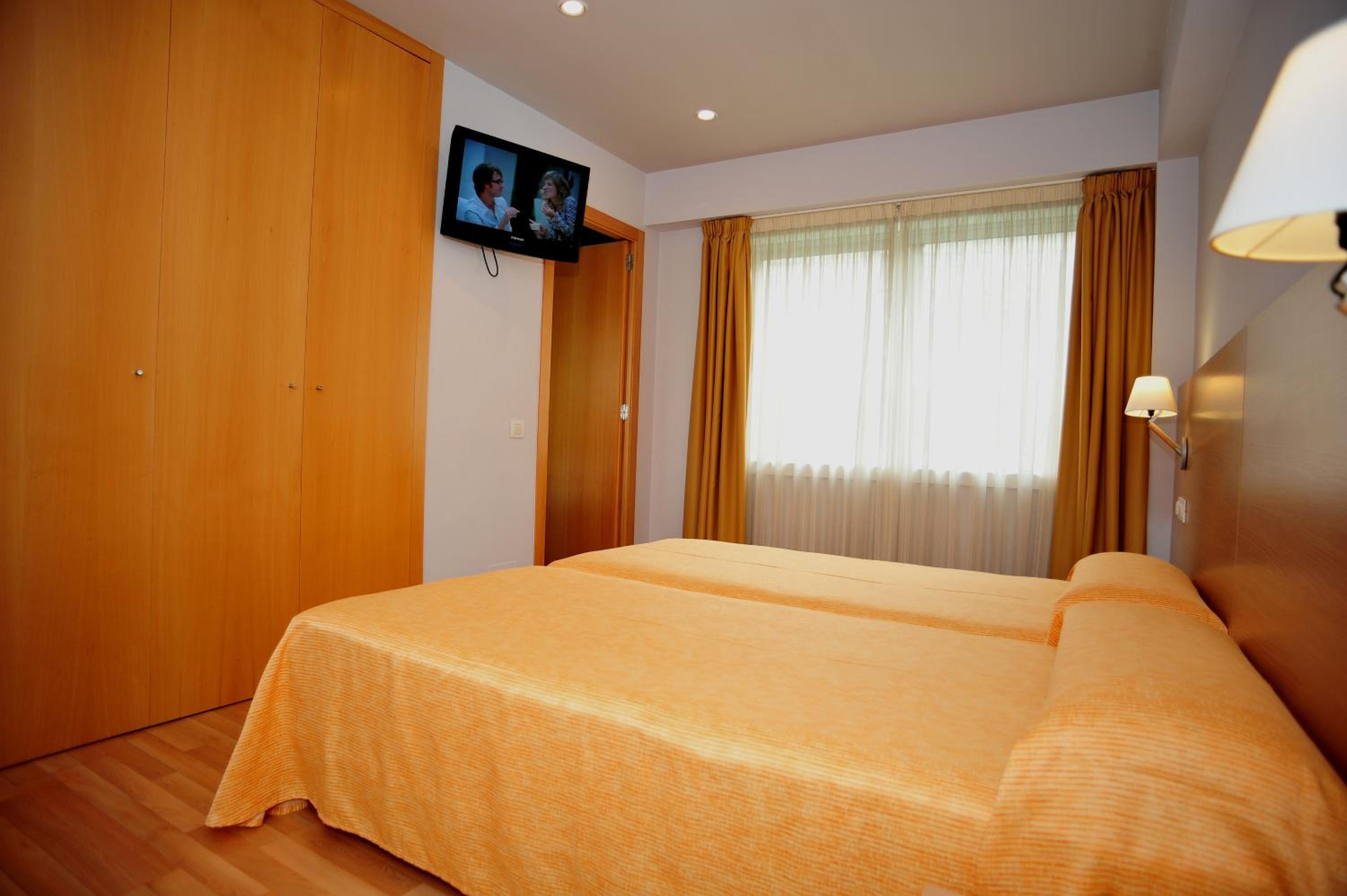 Habitación Doble con Dos Camas Dobles