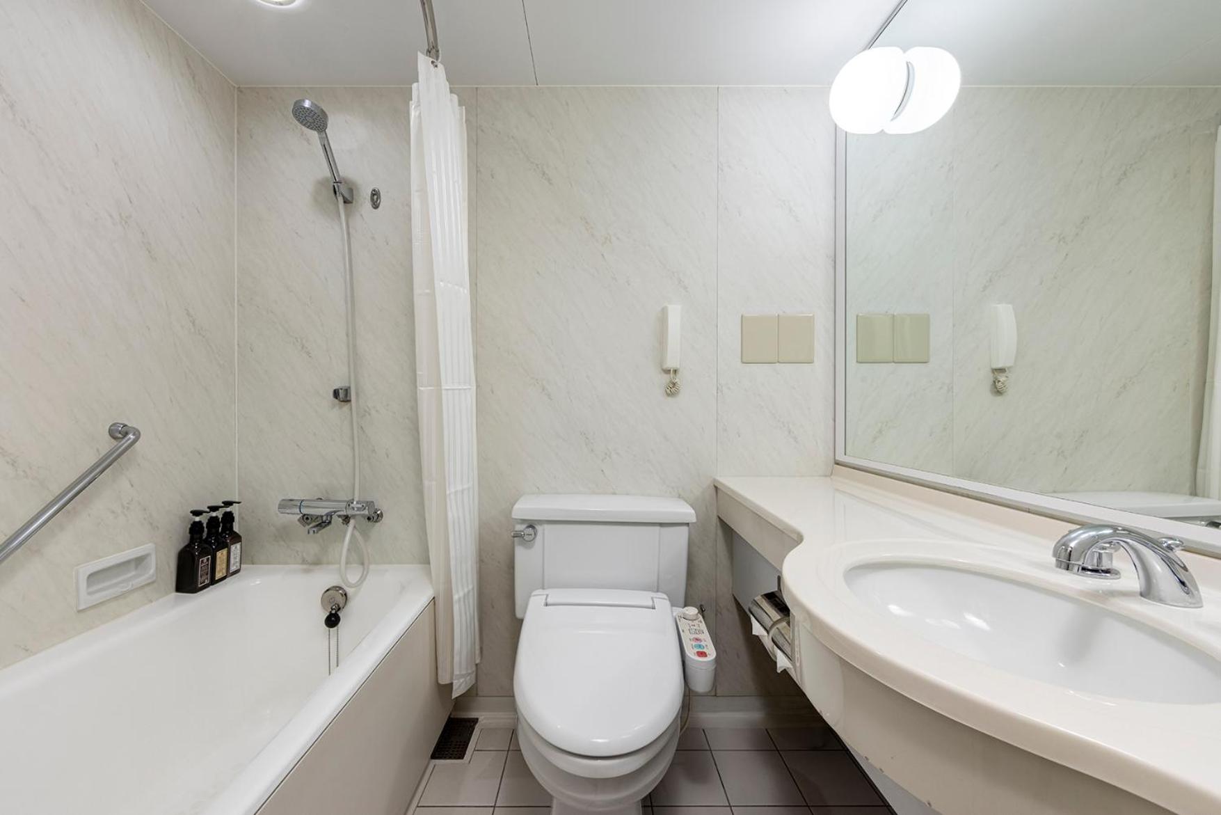 Standard Twin Room - Photo 8