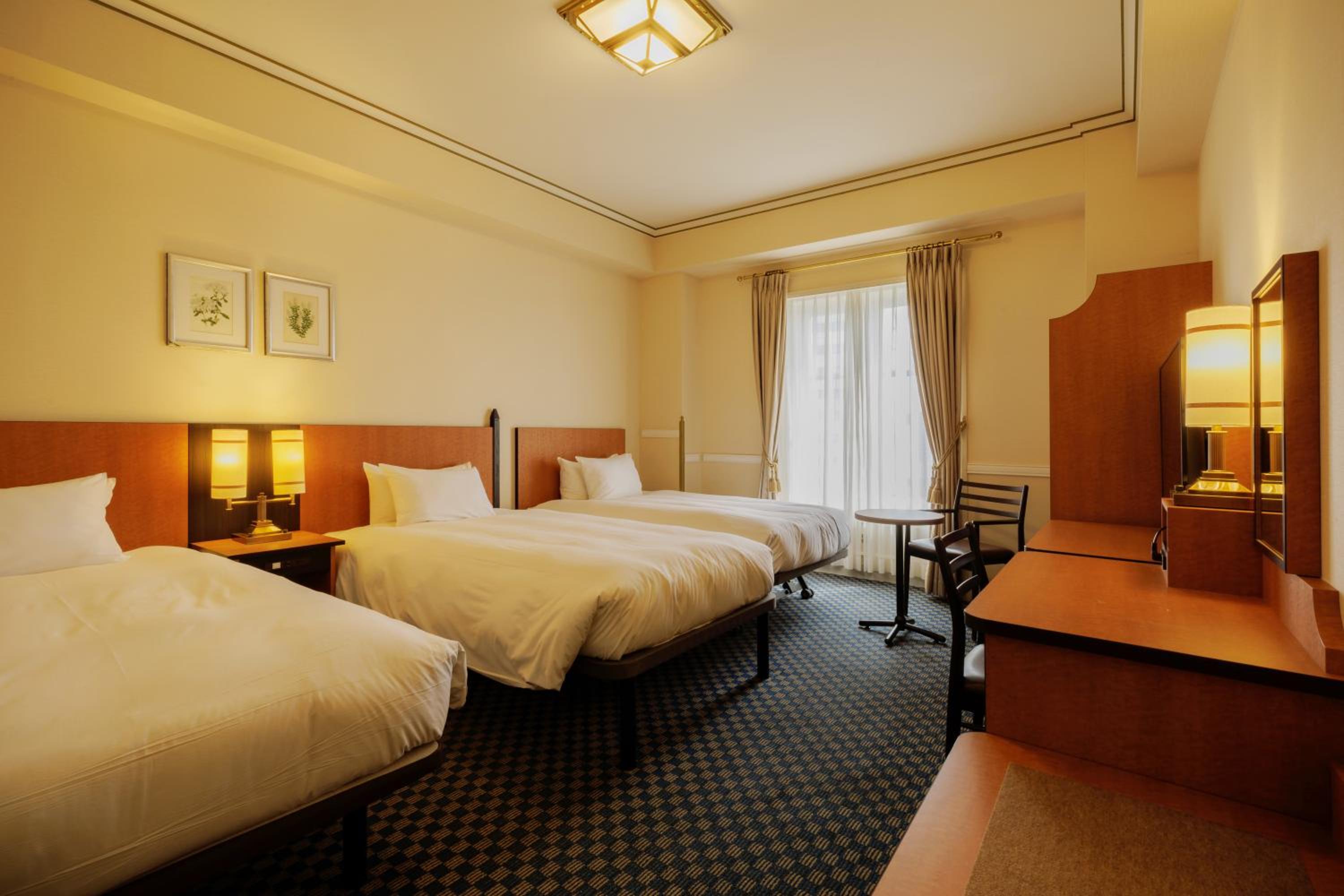 Top Floor Standard Triple Room - Photo 1
