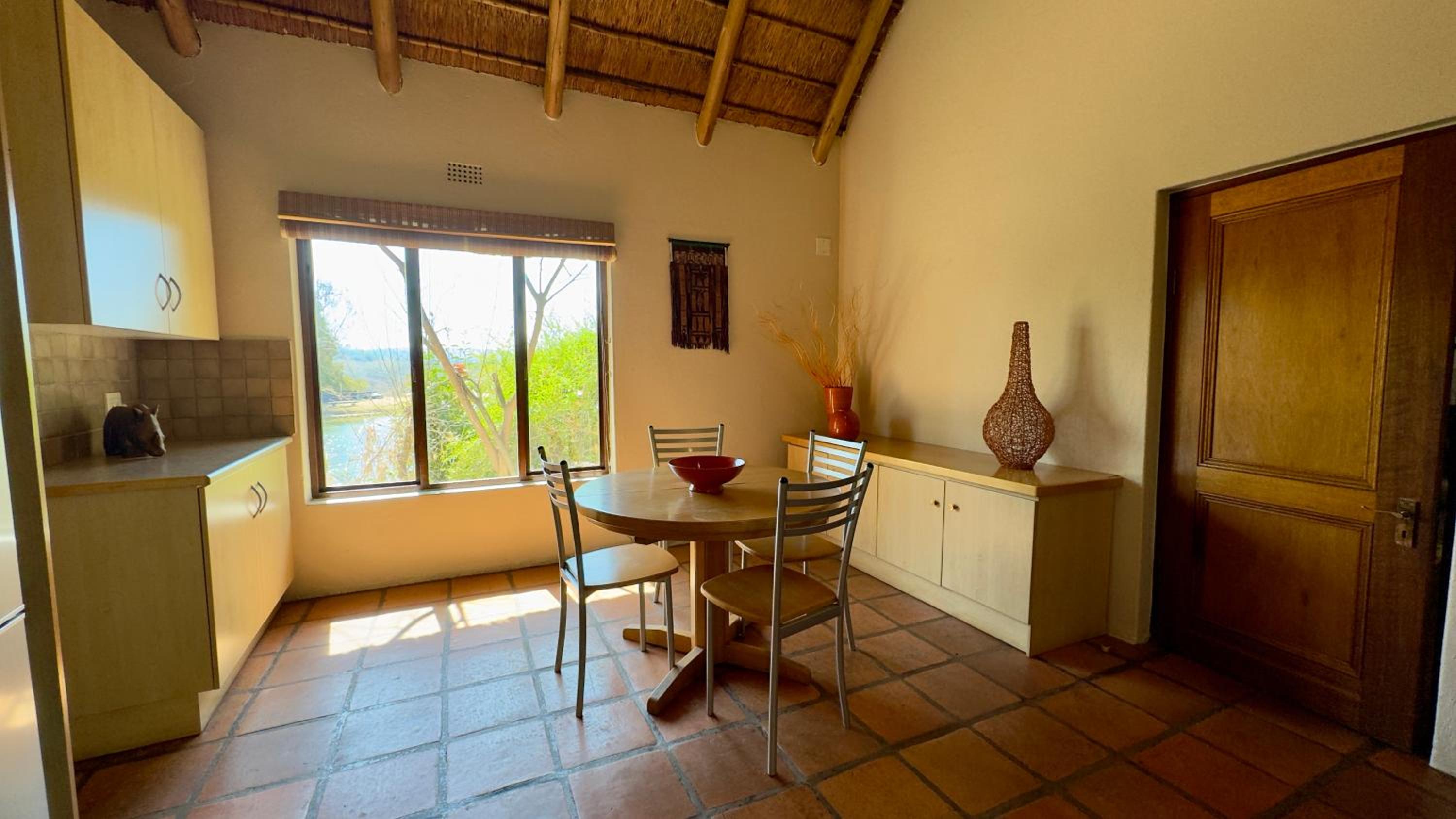 Thatch Cottage With Patio photo 2