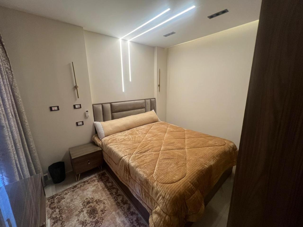 Three-Bedroom Apartment photo 1