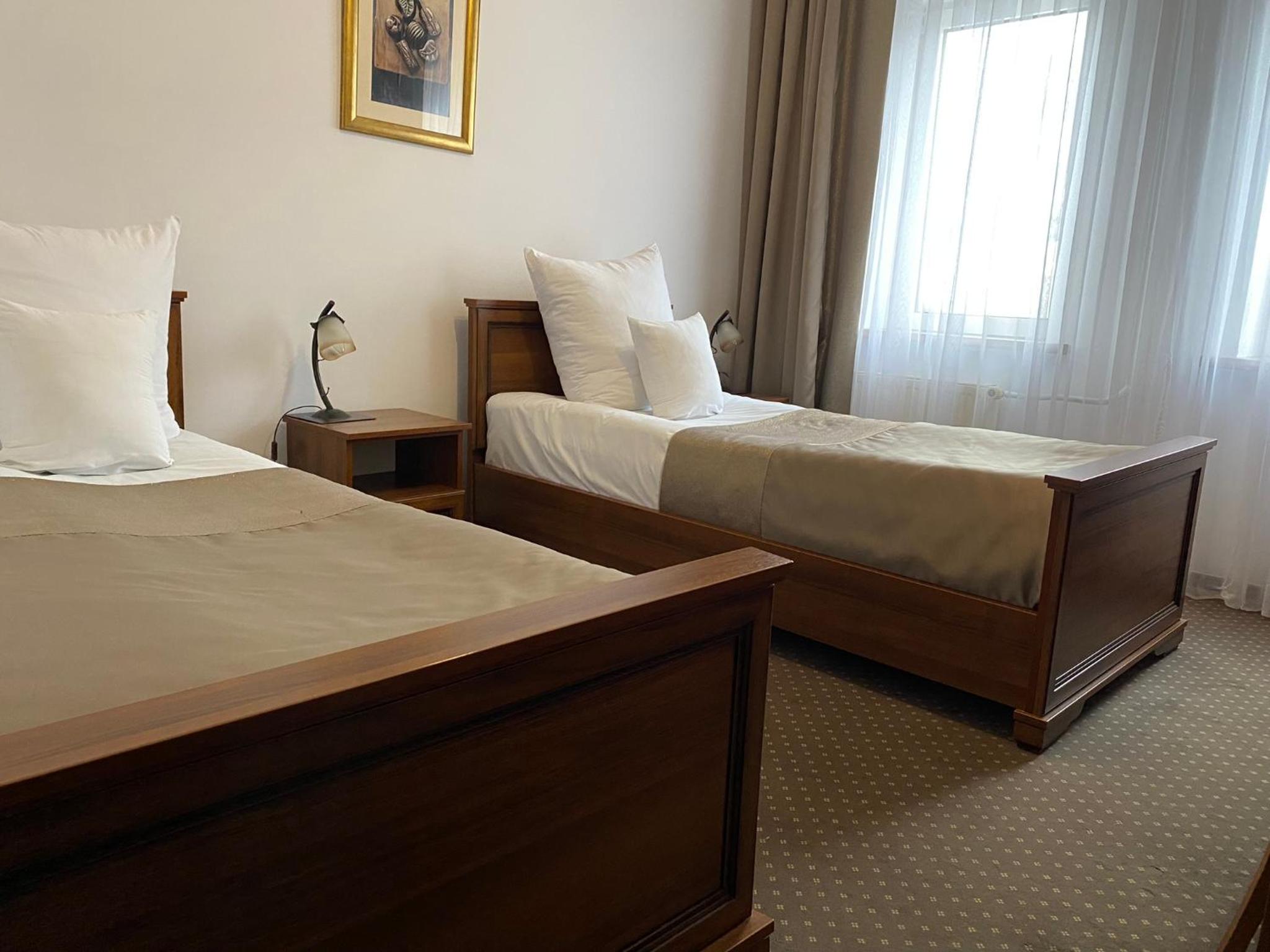 Twin Room - Photo 1