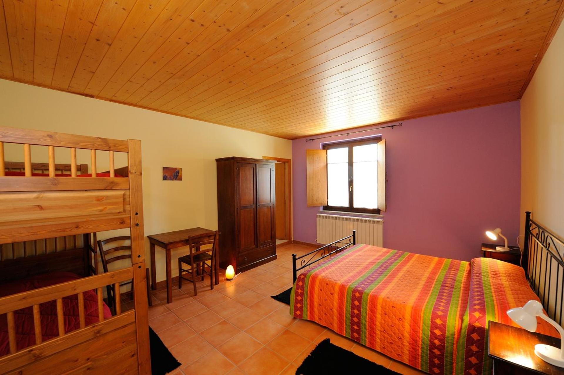Quadruple Room with Private Bathroom photo 1