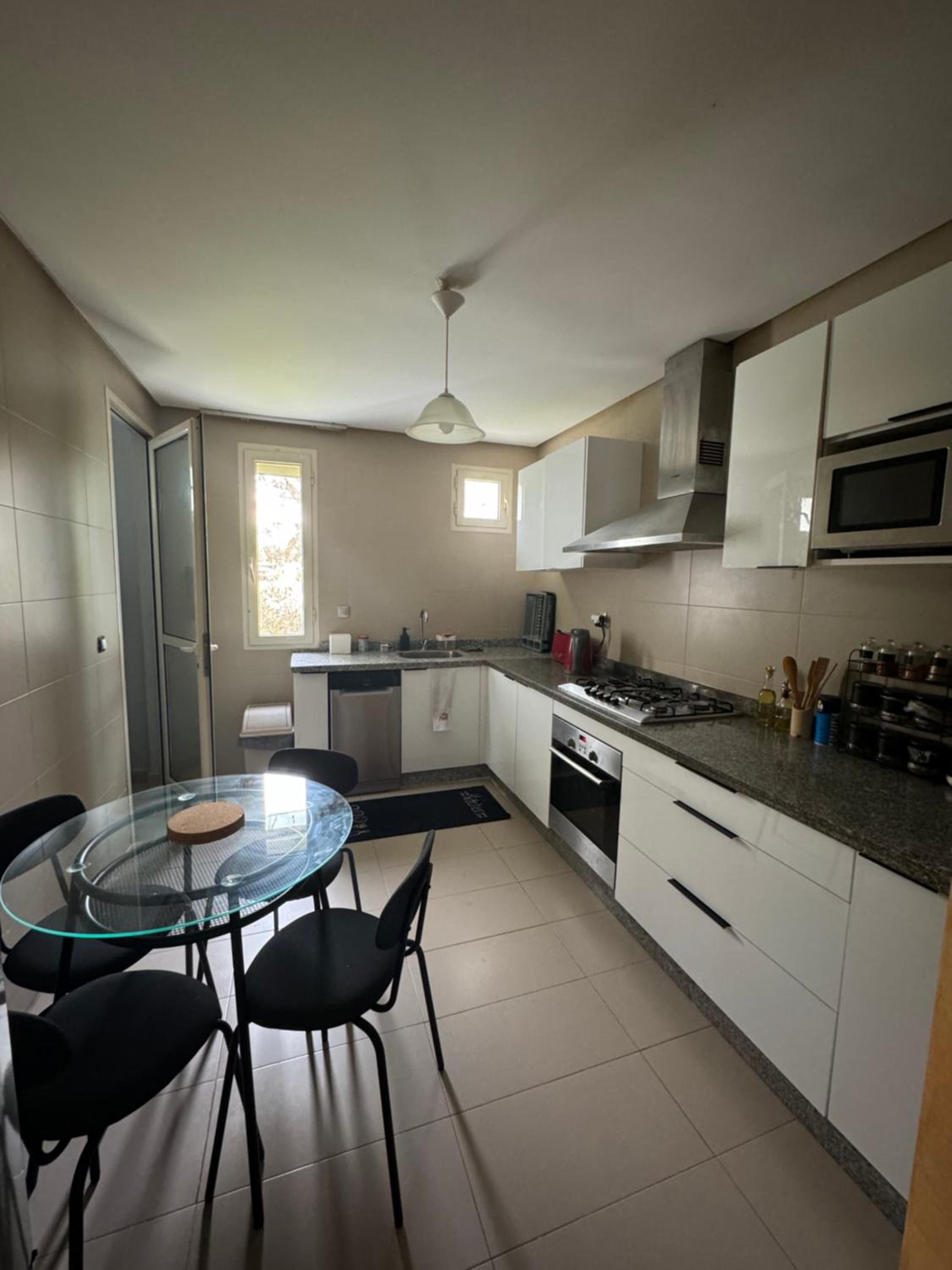 Three-Bedroom Apartment photo 2