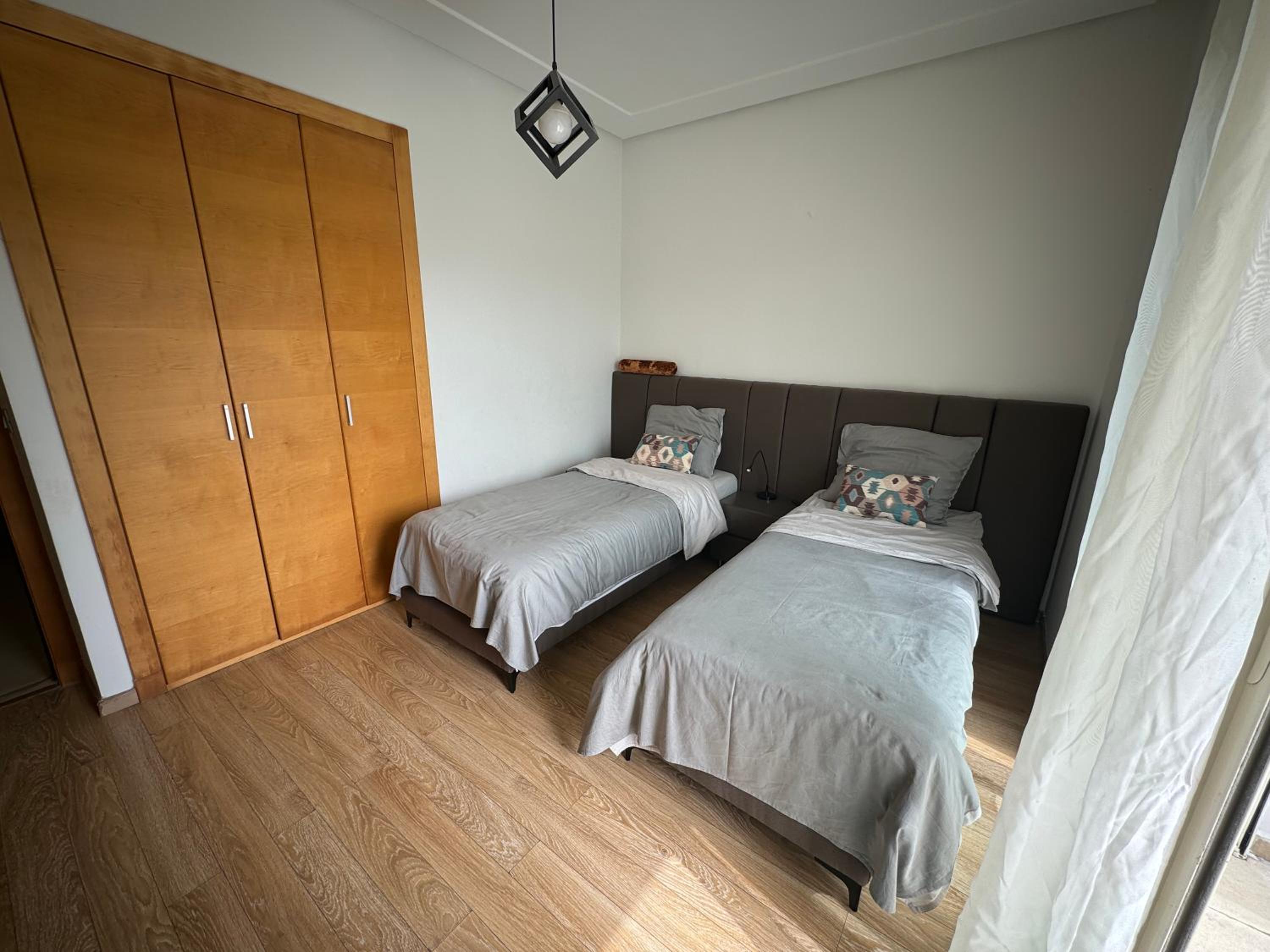 Three-Bedroom Apartment photo 1