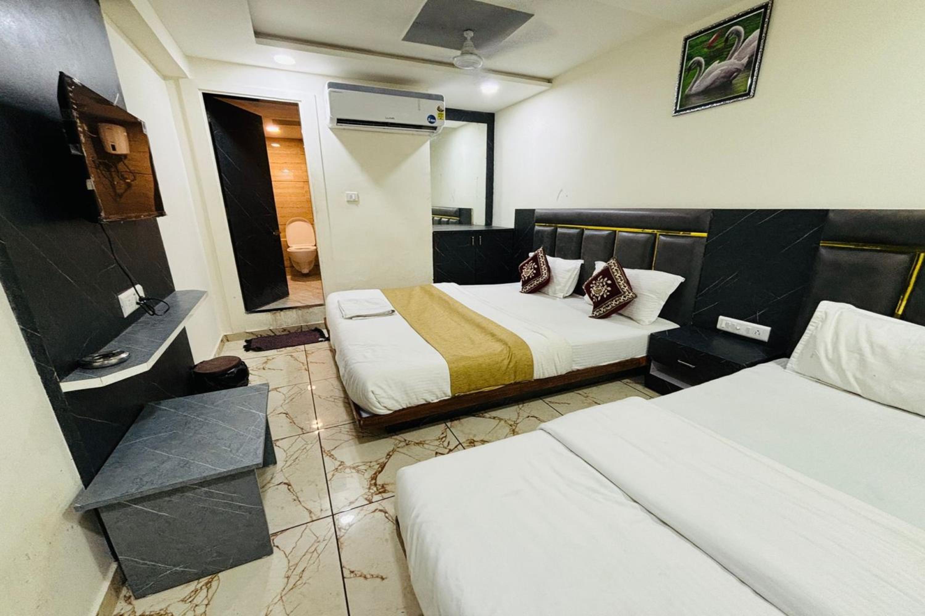 Deluxe Triple Room - Photo 17