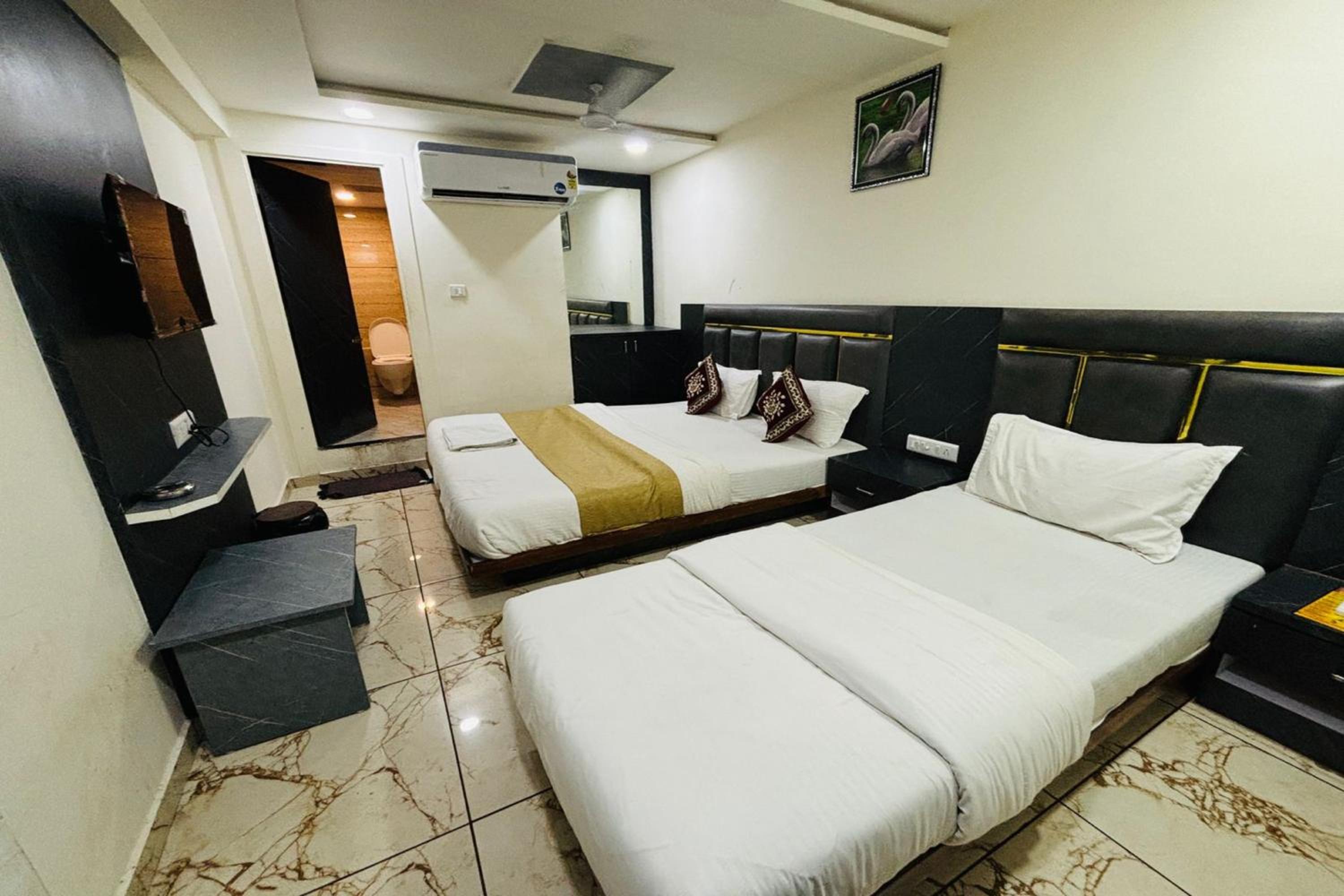Deluxe Triple Room - Photo 15