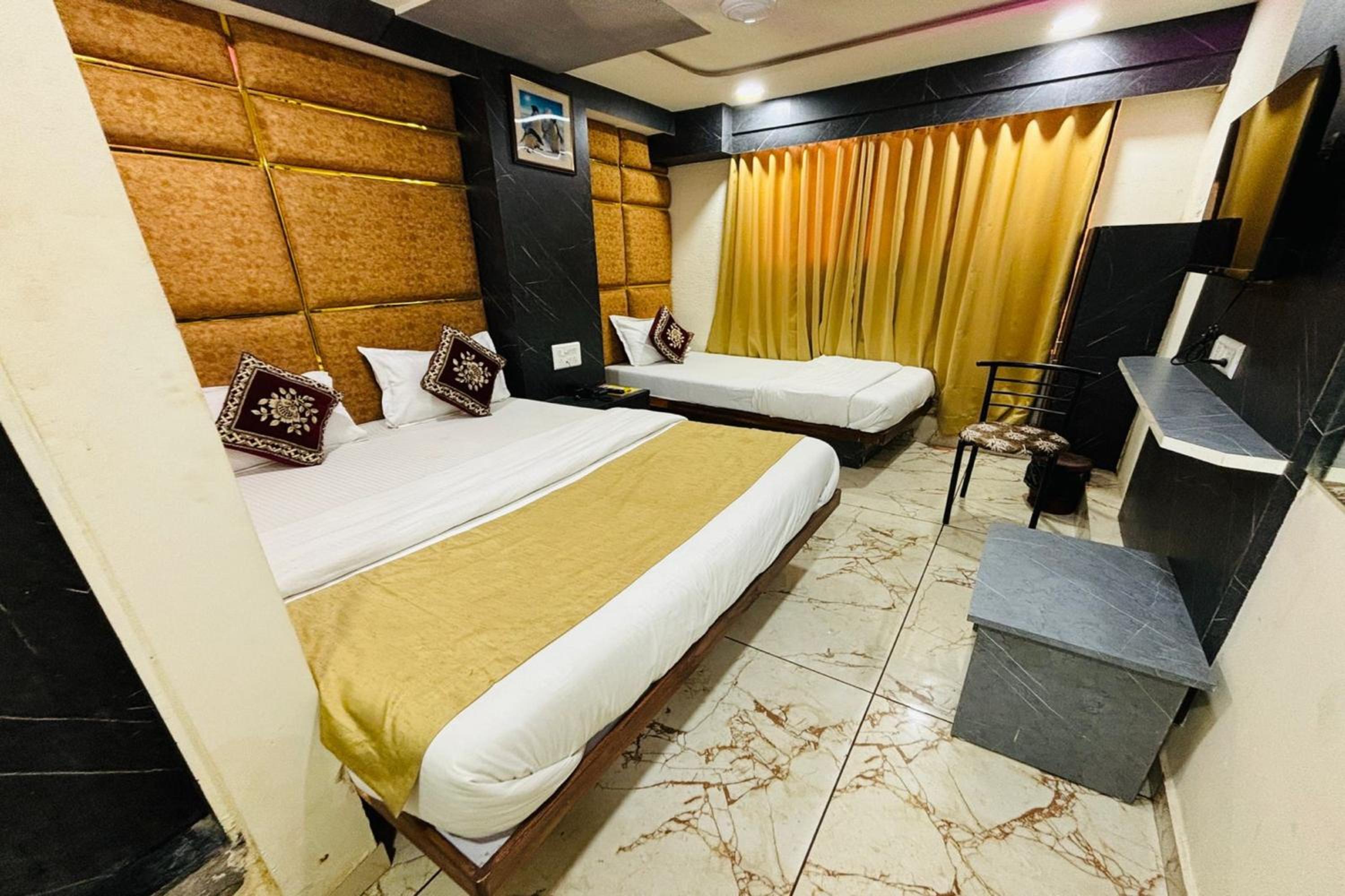 Deluxe Triple Room - Photo 8