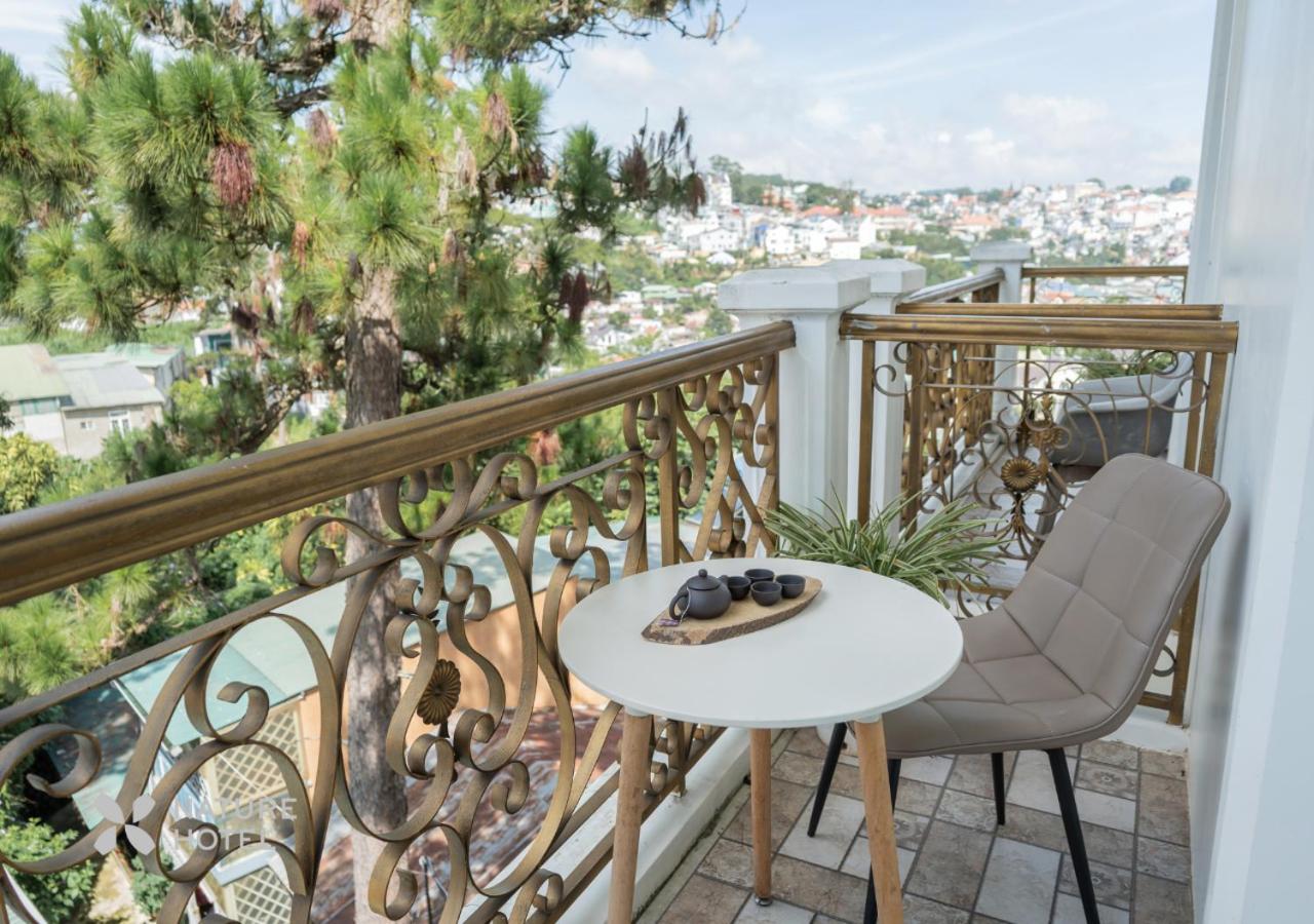 Quadruple Room with Balcony - Photo 1