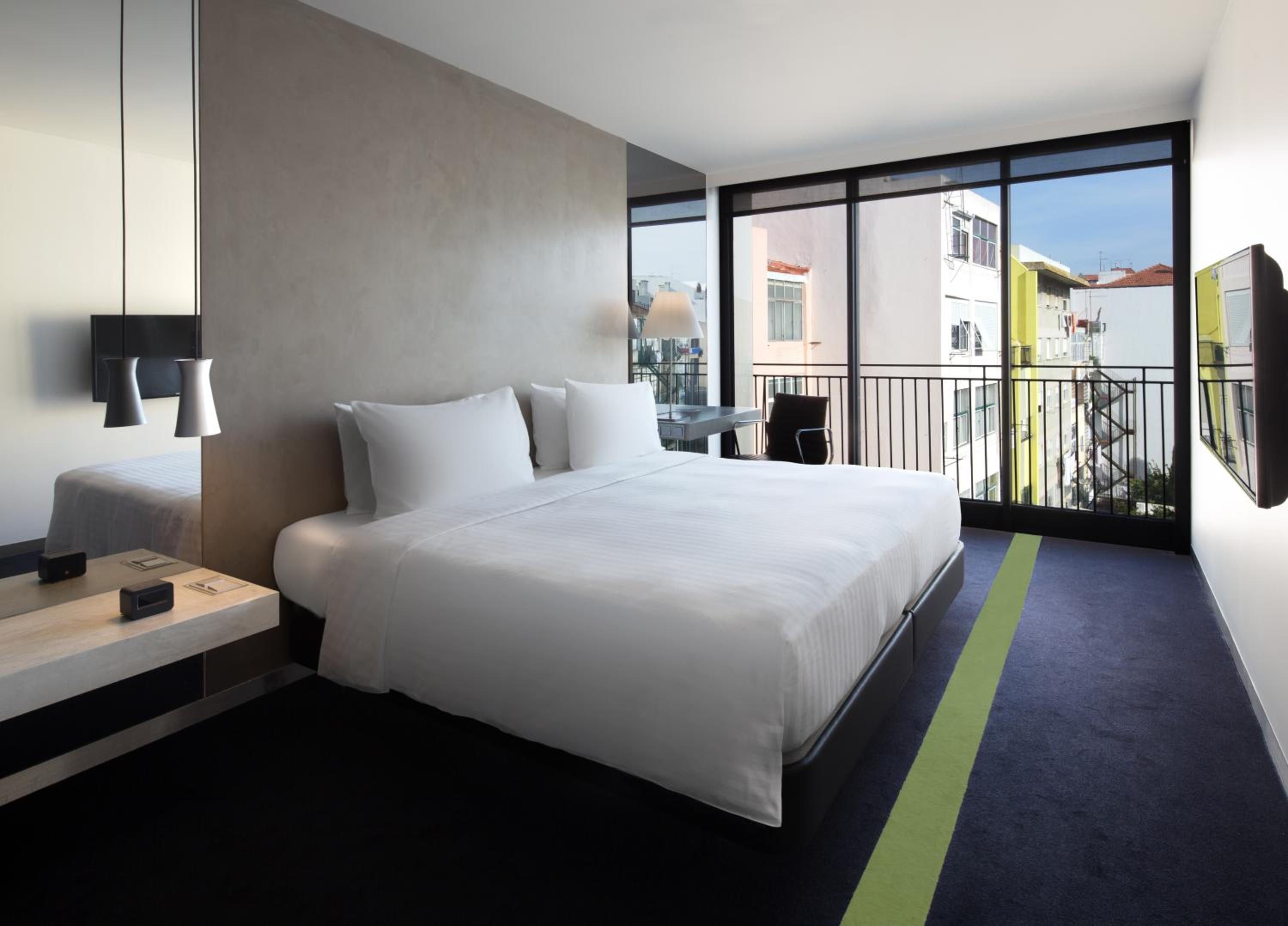 King Room with Patio View and Balcony - Photo 1