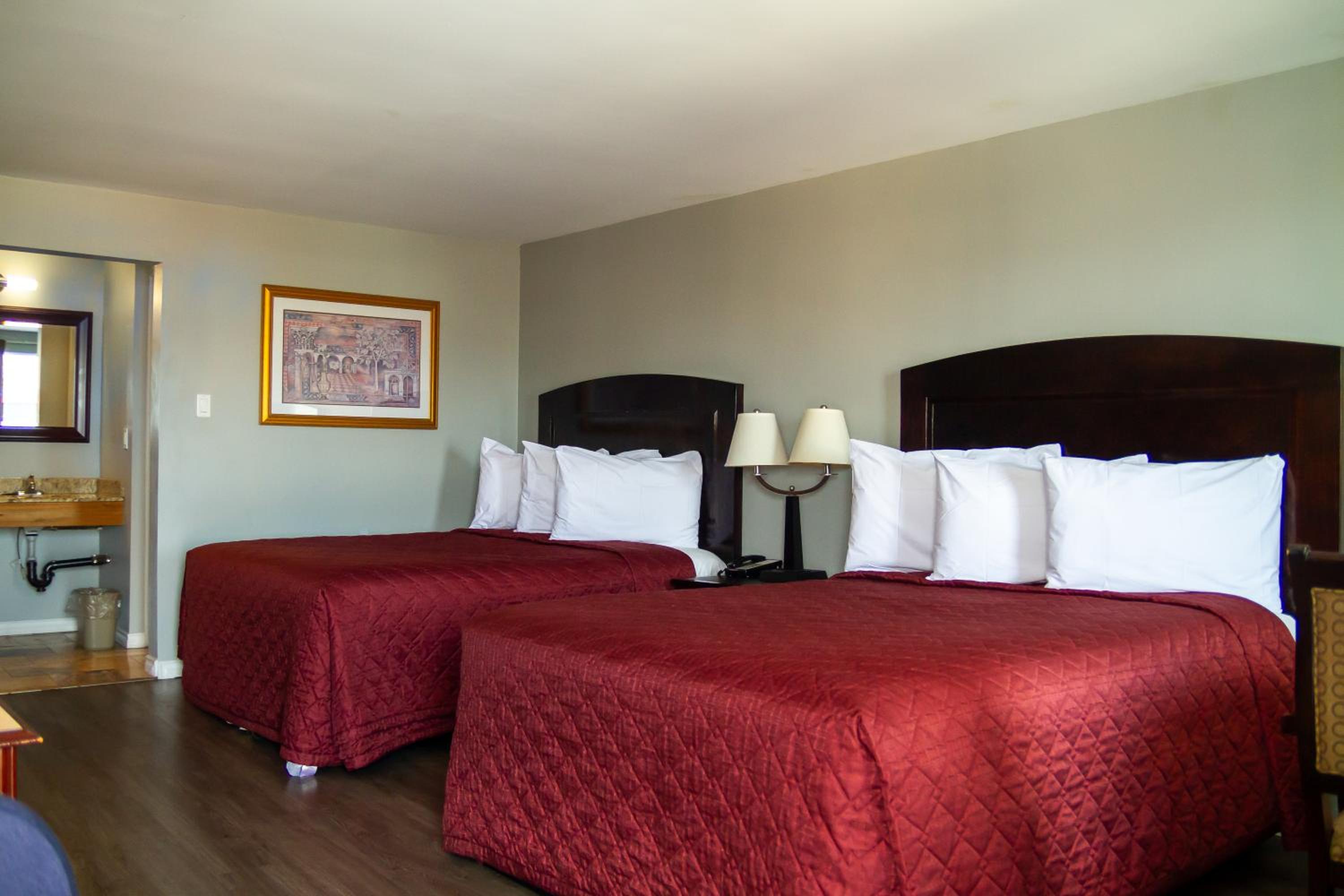 Queen Room with Two Queen Beds - Photo 1