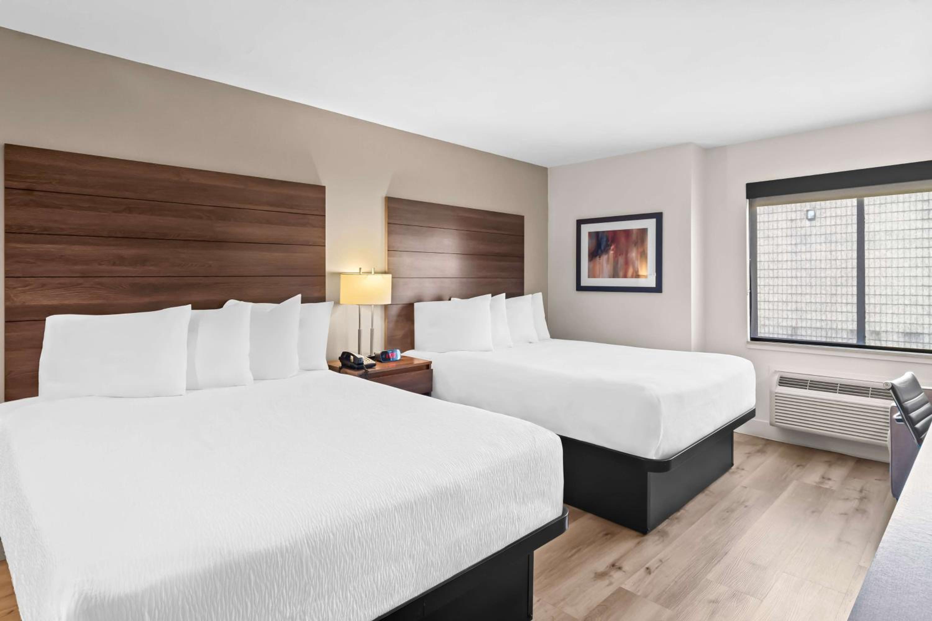 Queen Room with Two Queen Beds and Kitchenette - Non-Smoking - Photo 1