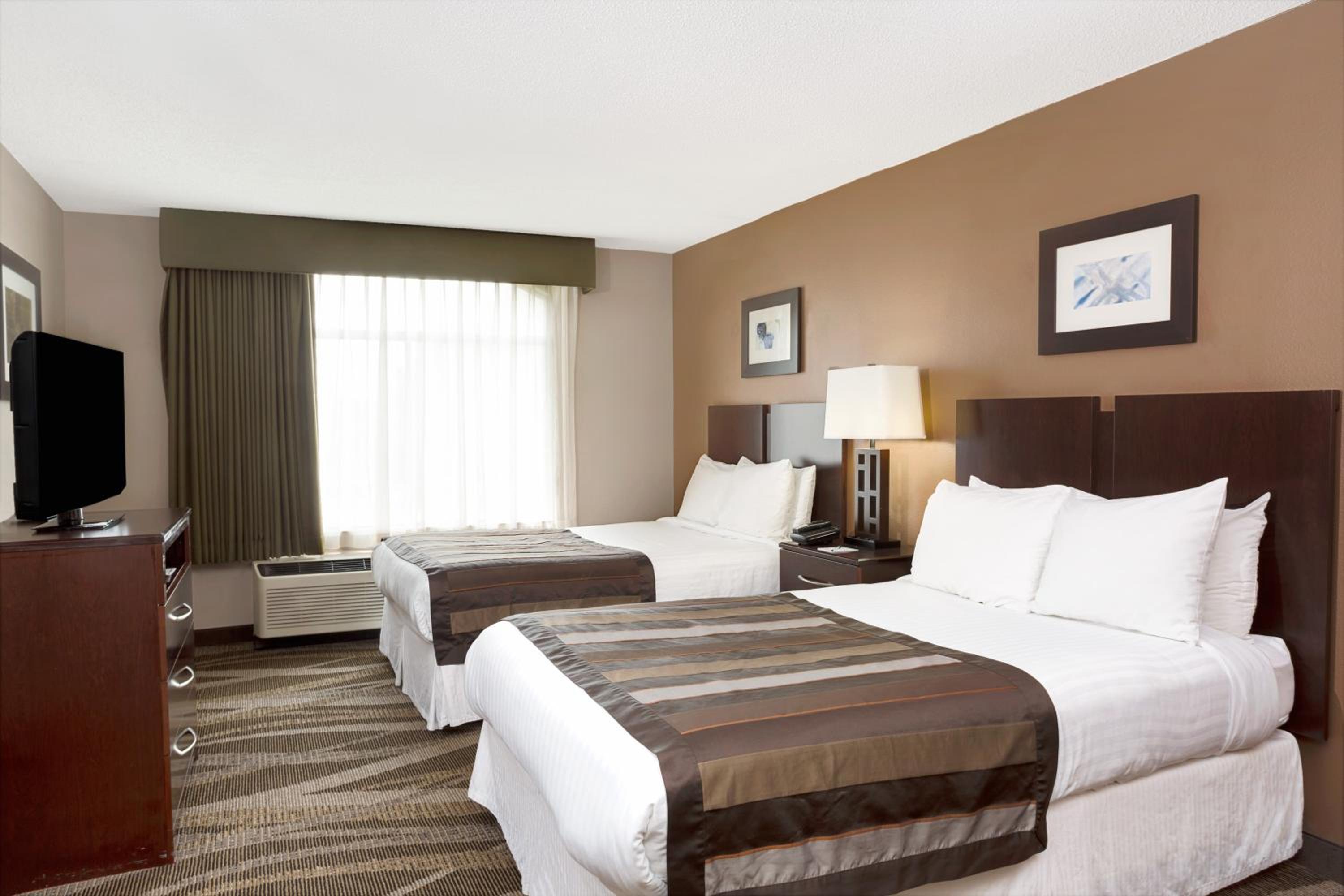 Queen Room with Two Queen Beds - Non-Smoking at Wingate by Wyndham Raleigh Durham / Airport in Durham