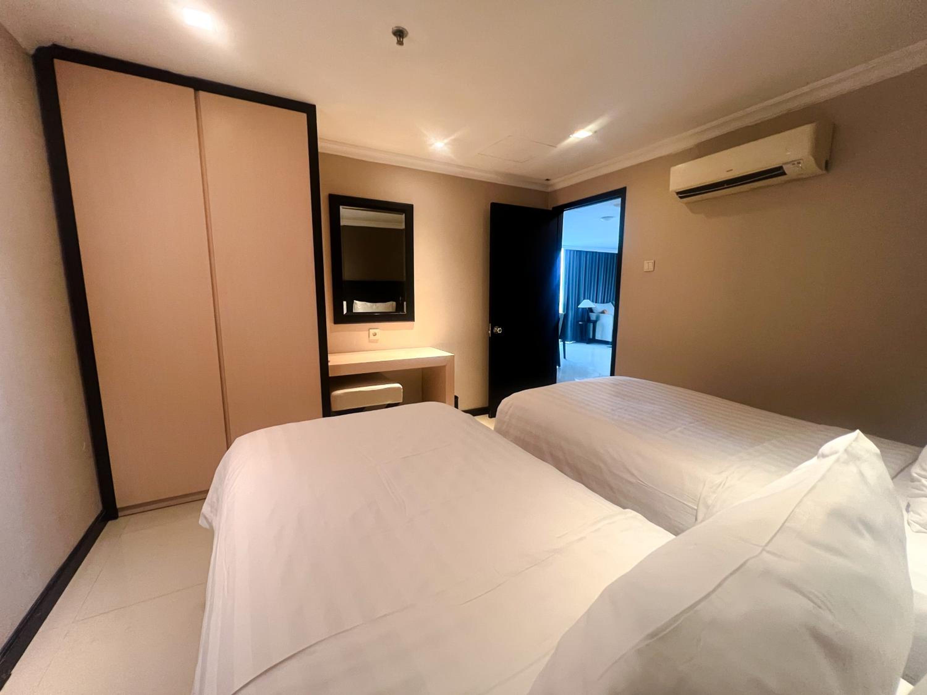 Three-Bedroom Deluxe Apartment - Photo 1
