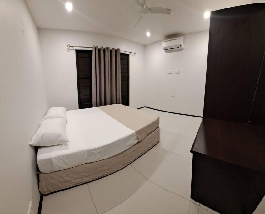 Three-Bedroom Apartment photo 2