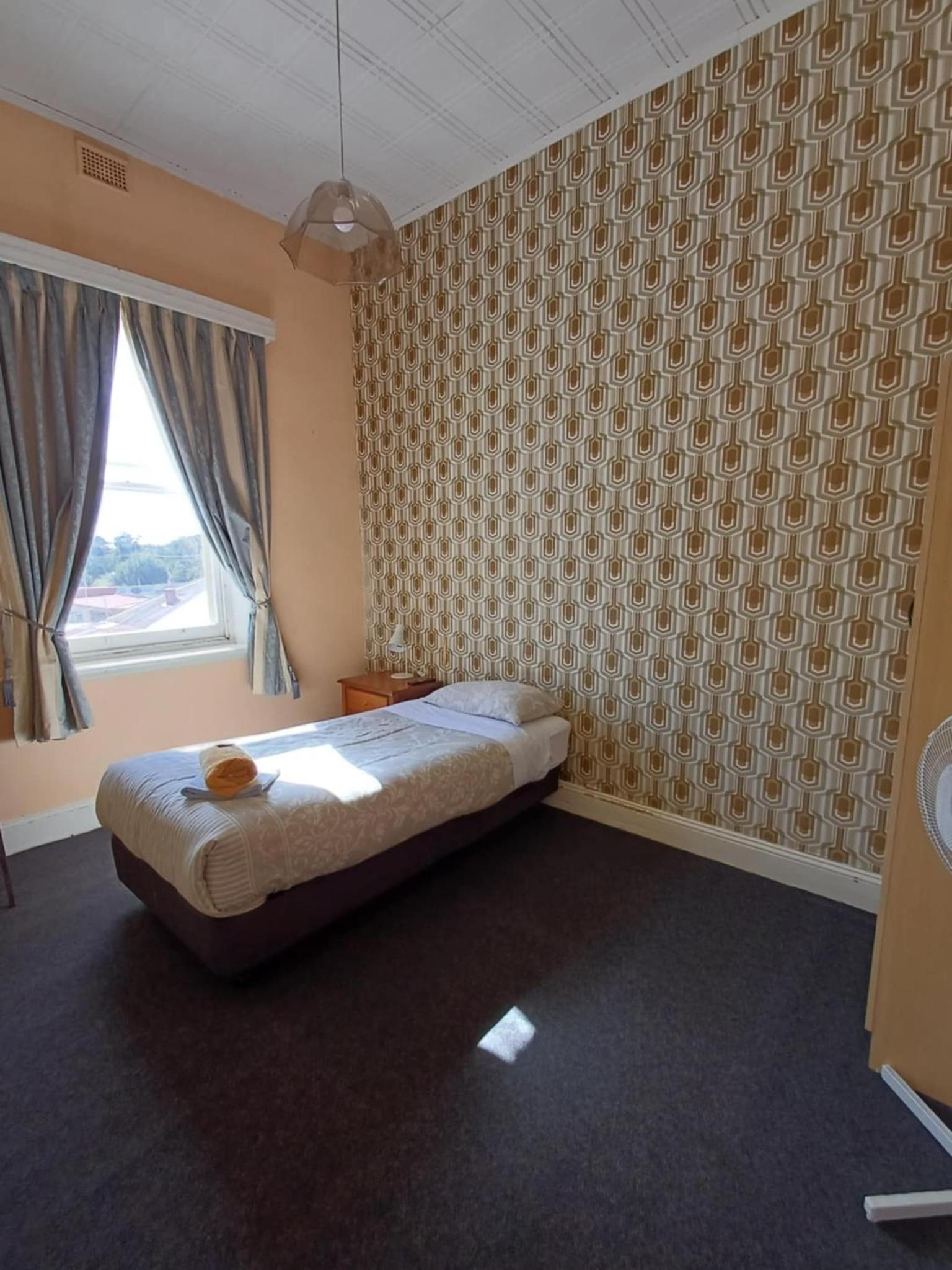 Single Room with Shared Shower and Toilet