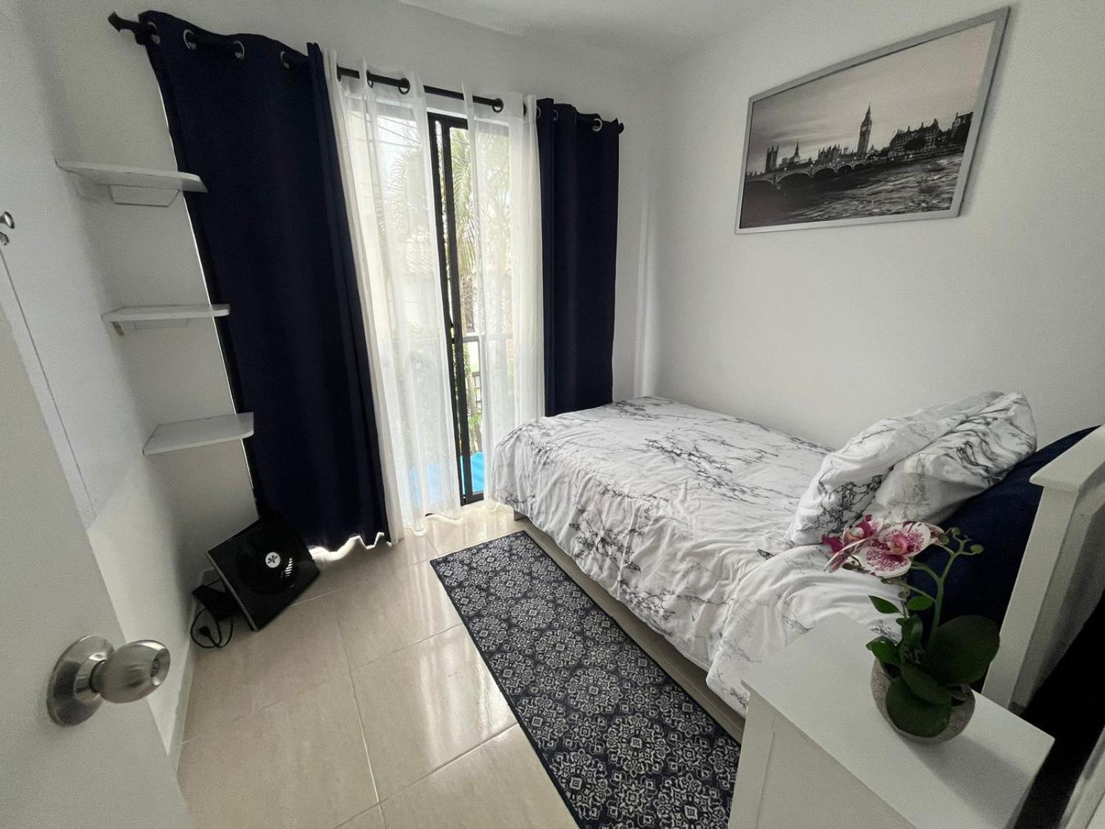 Three-Bedroom Apartment photo 2