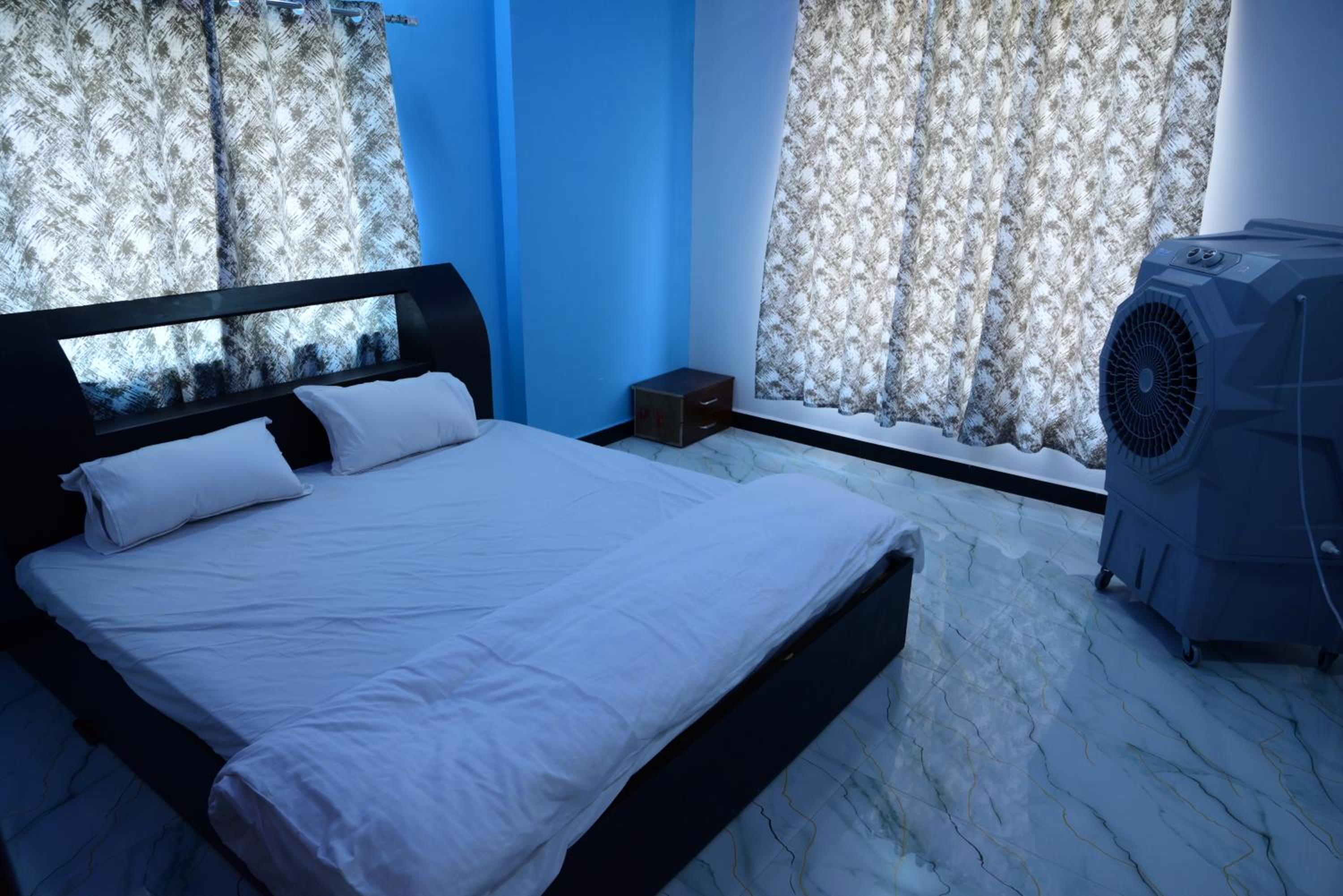 Deluxe Double Room (2 Adults + 1 Child) photo 2