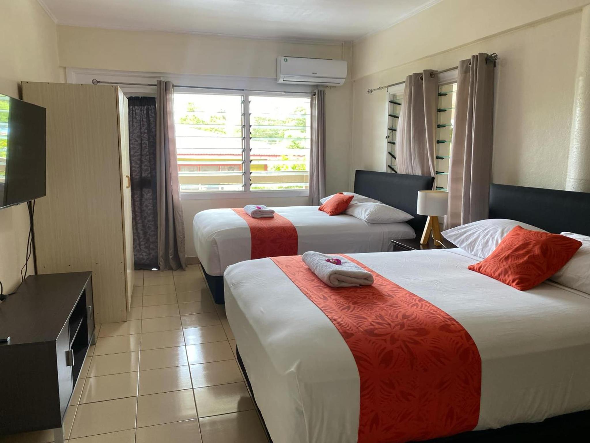 Standard Queen Room with Two Queen Beds photo 2