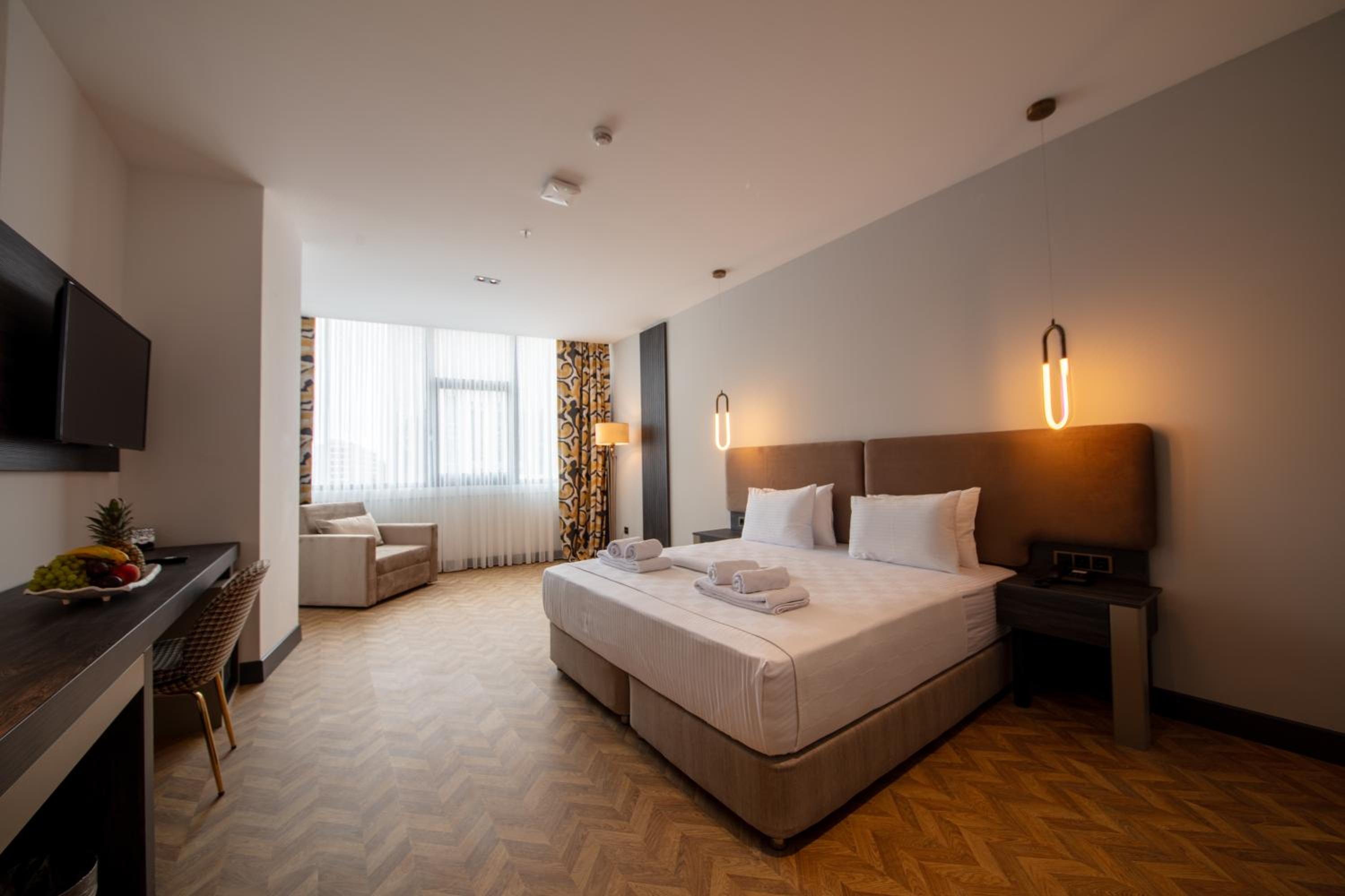 Deluxe Room - Photo 1