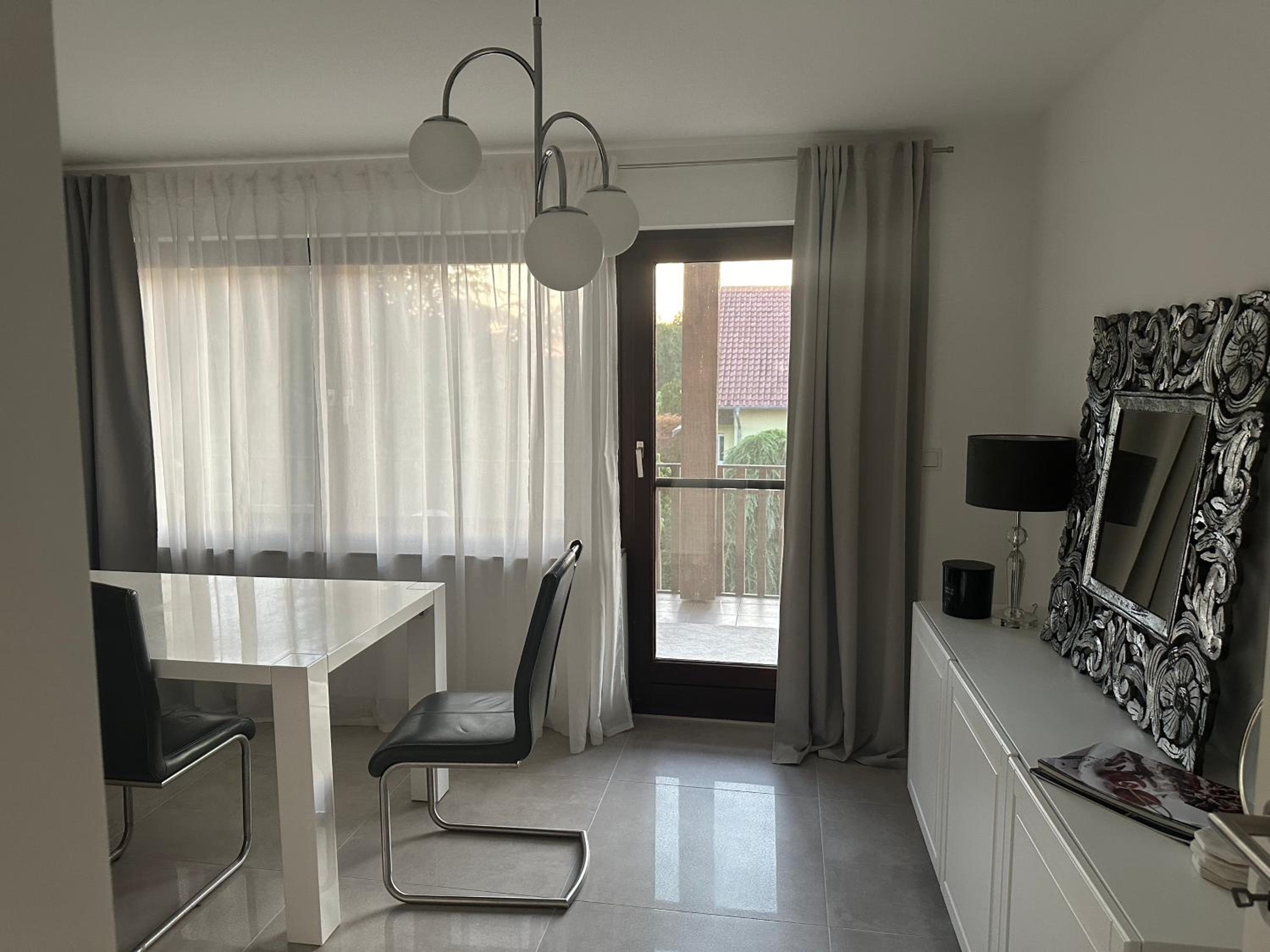 Three-Bedroom Apartment with Balcony photo 1
