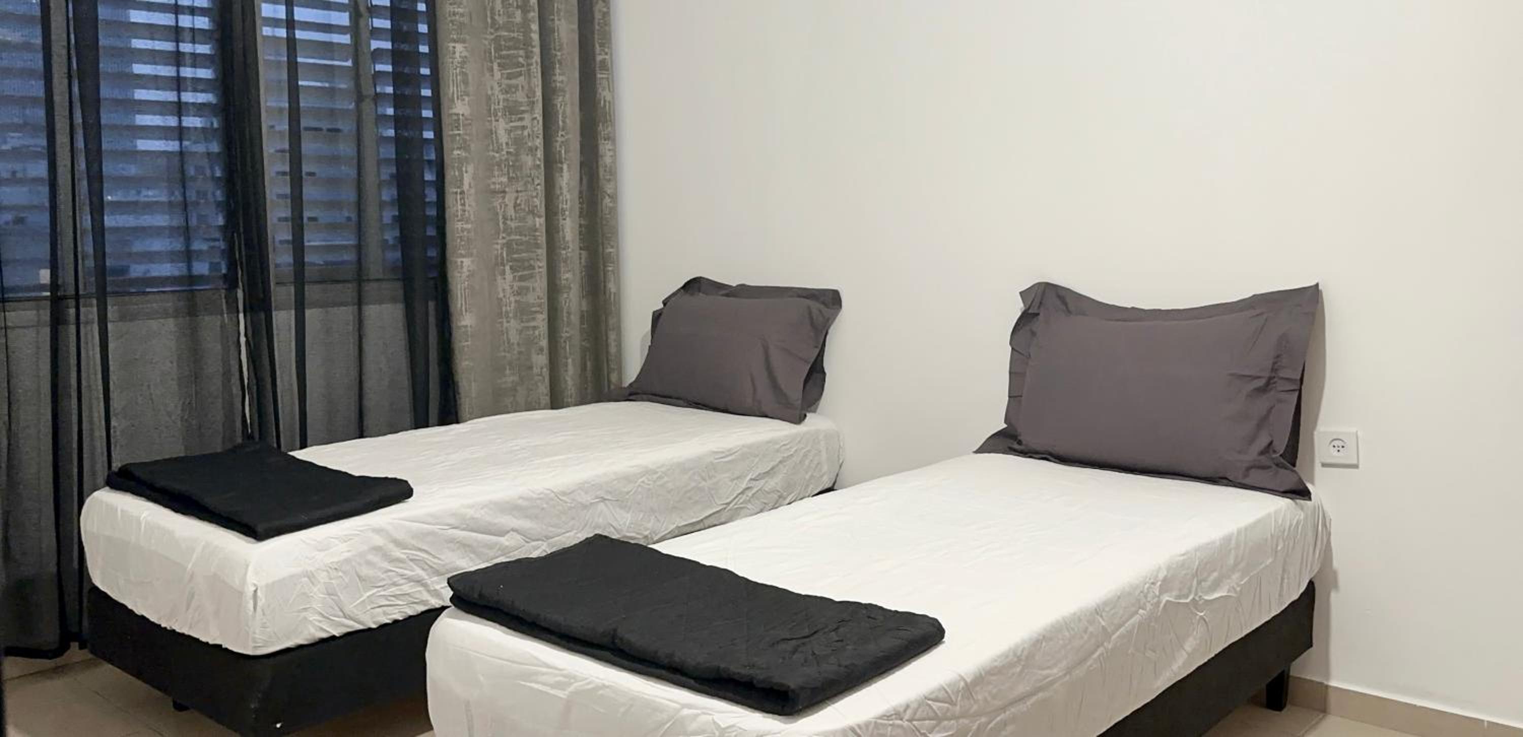Deluxe Family Suite - Photo 18