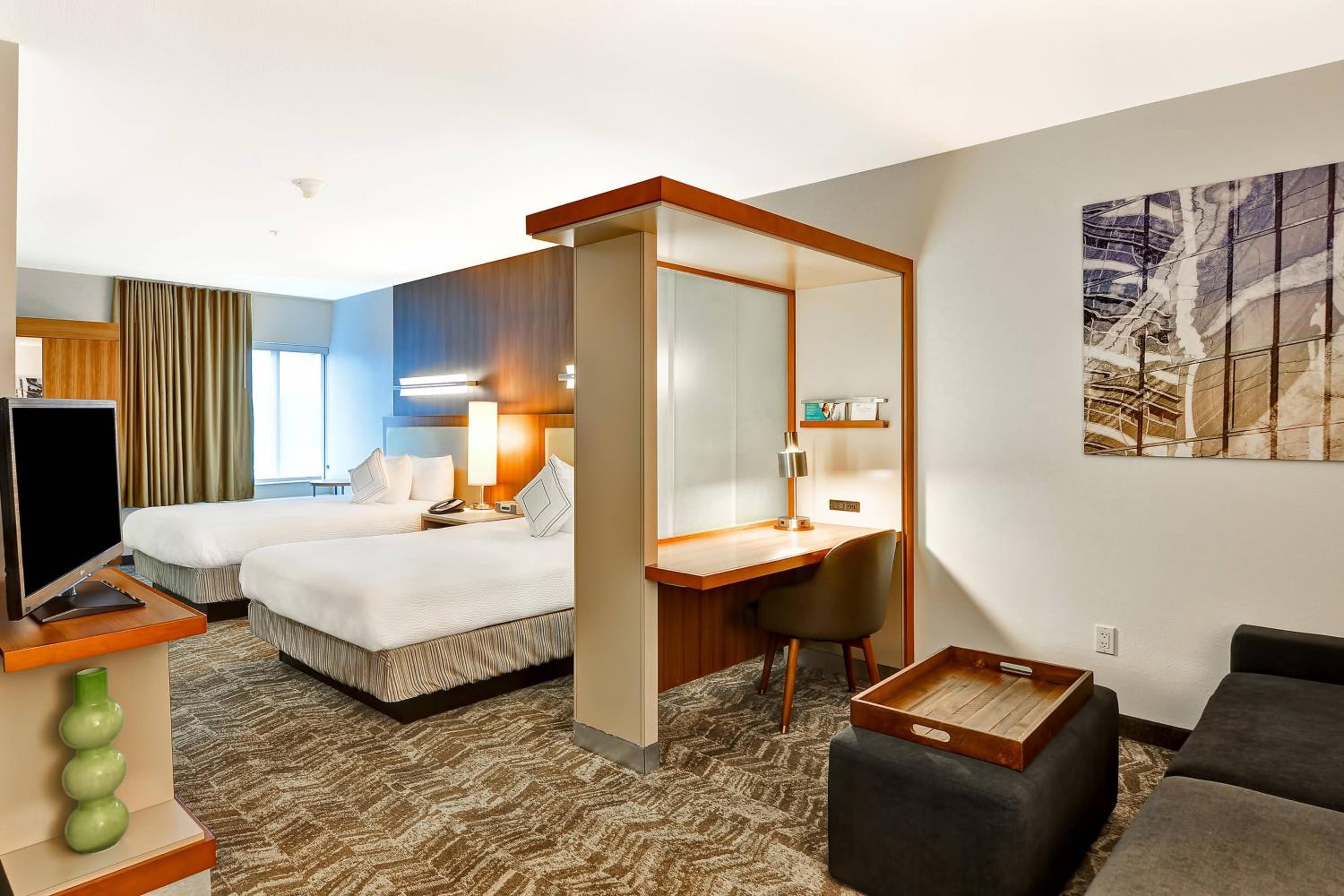 Queen Suite with Two Queen Beds and Trundle Sofa - Photo 1
