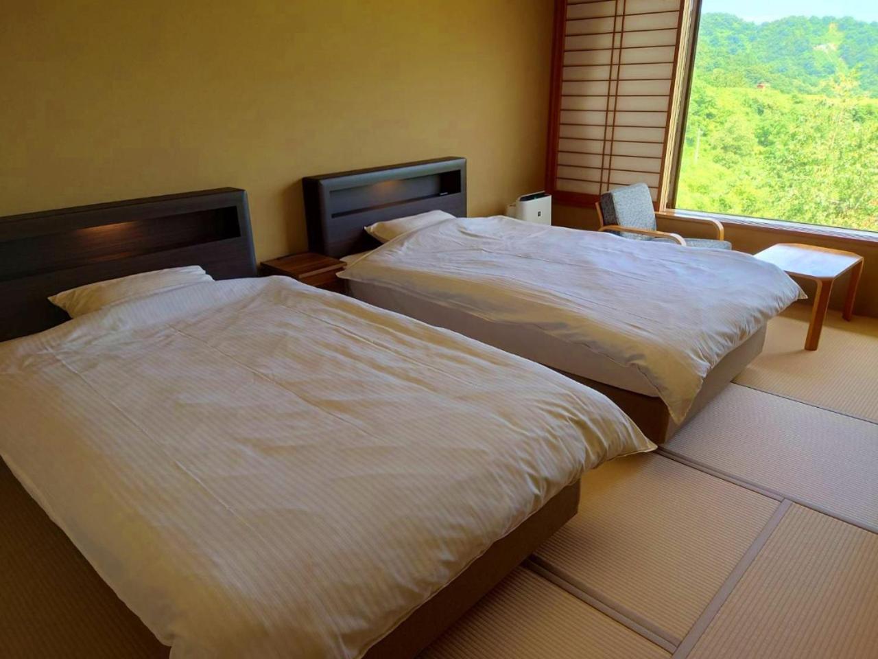 Standard Twin Room with Mountain View - Photo 1
