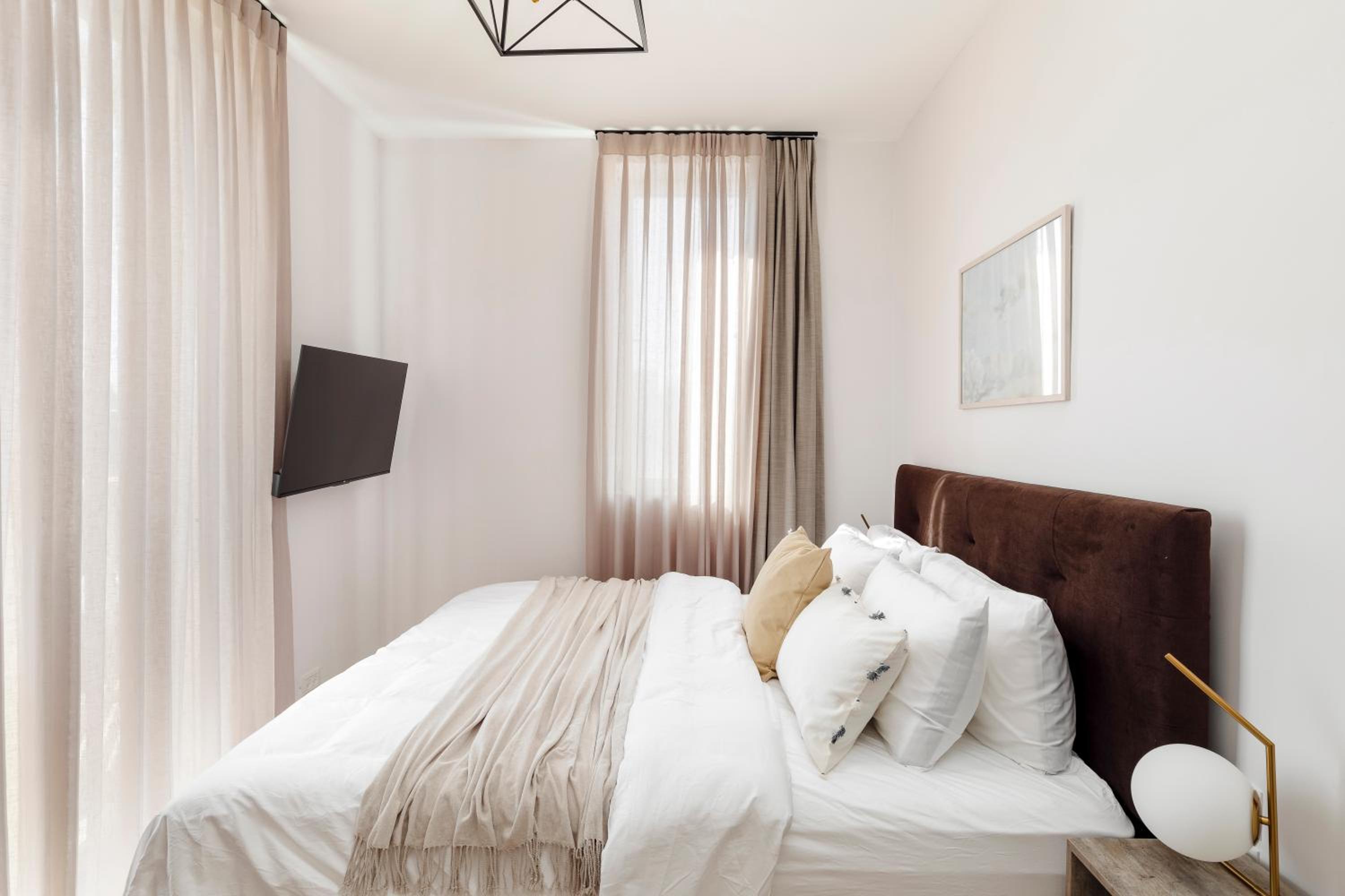 Four-Bedroom Apartment with Balcony